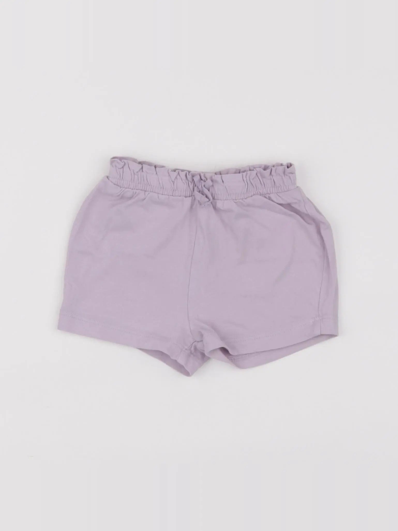H&M - short violet - 3/6 mois