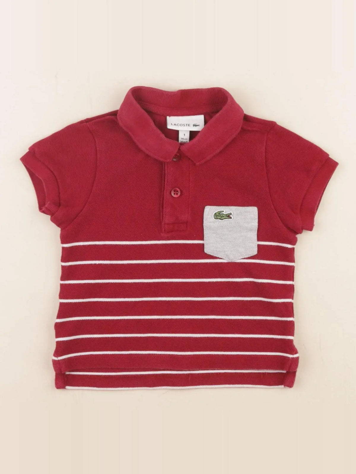 Lacoste - polo rouge - 1 an