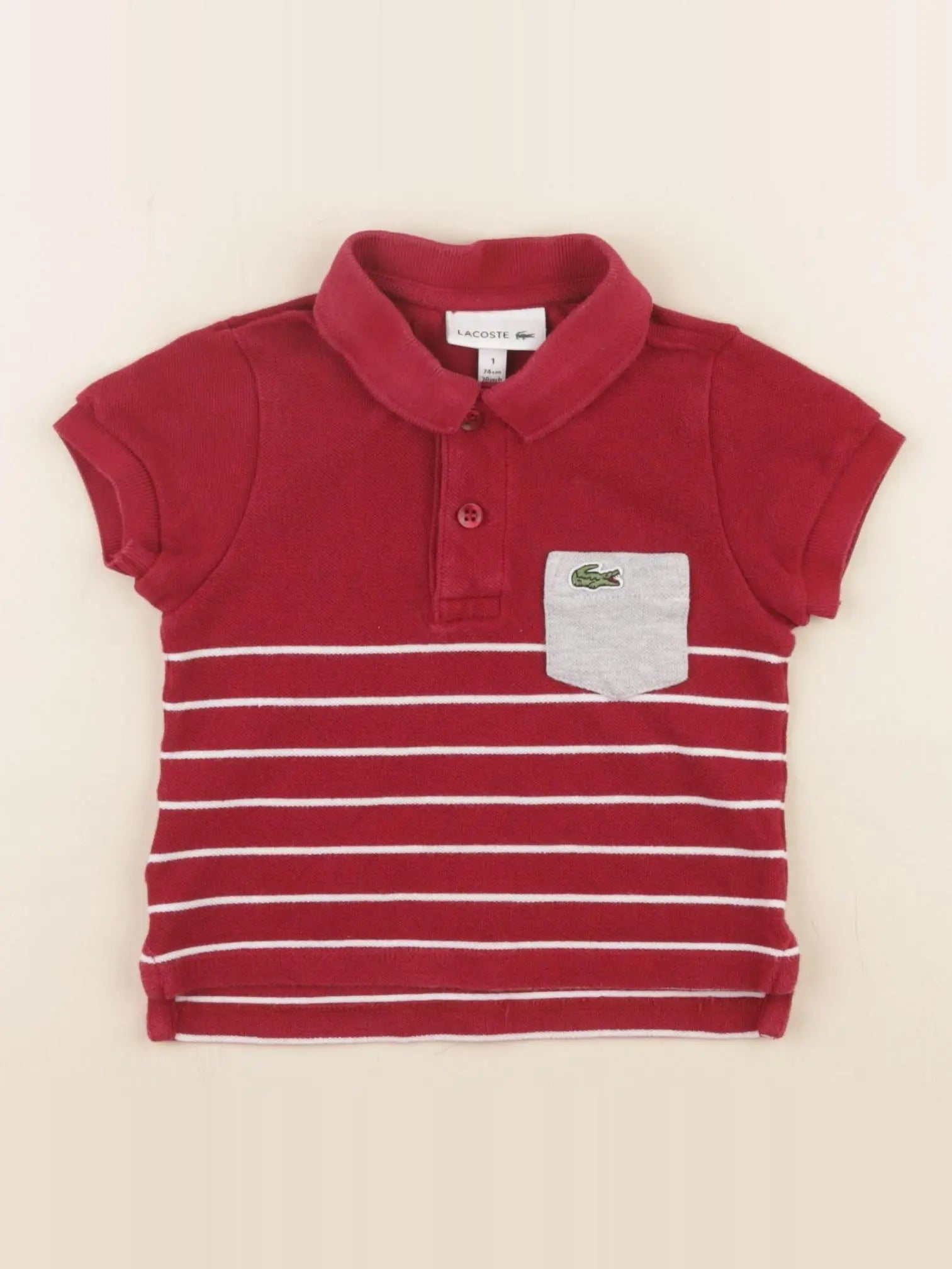 Lacoste - polo rouge - 1 an