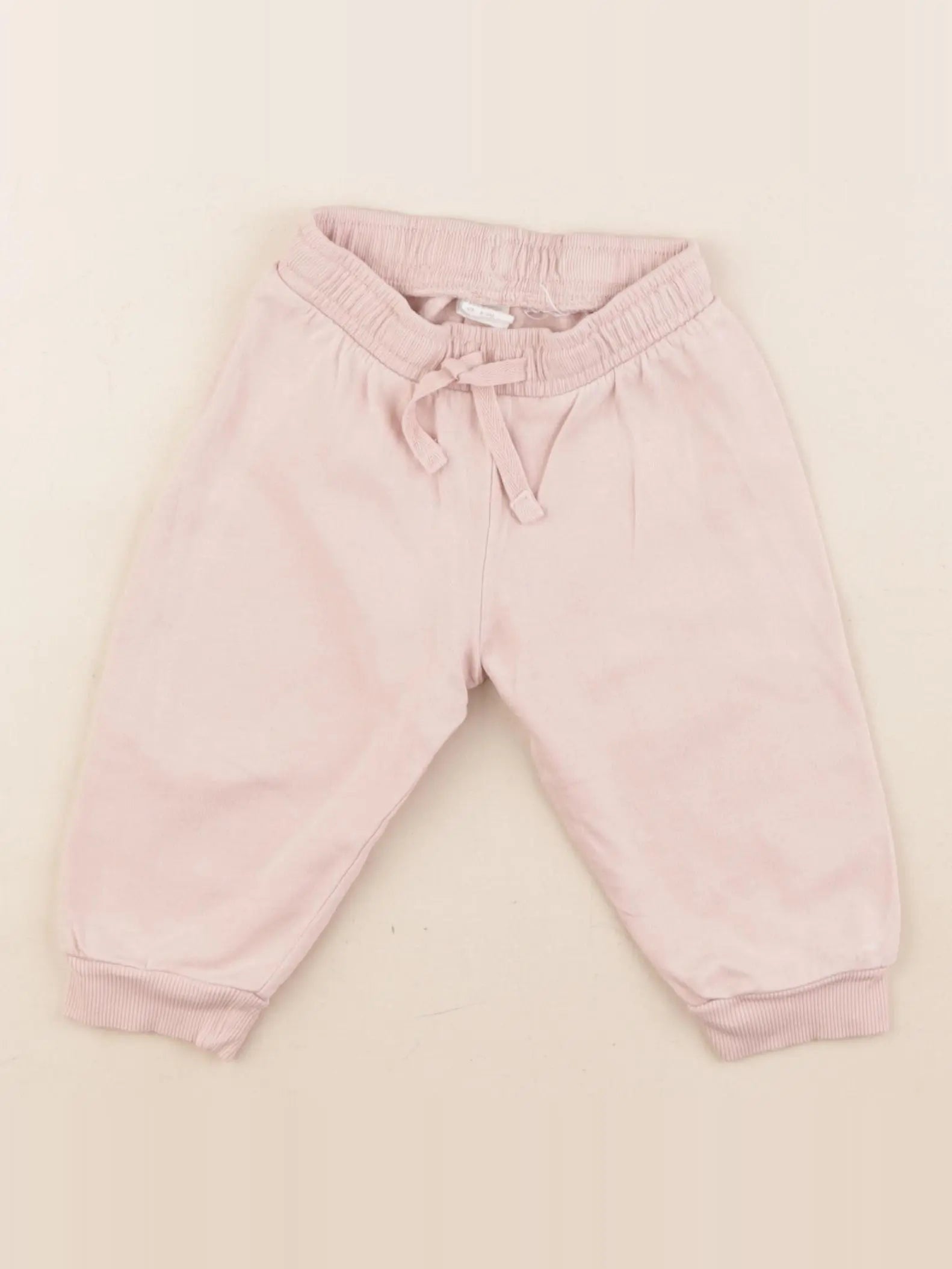 H&M - jogging rose - 6/9 mois