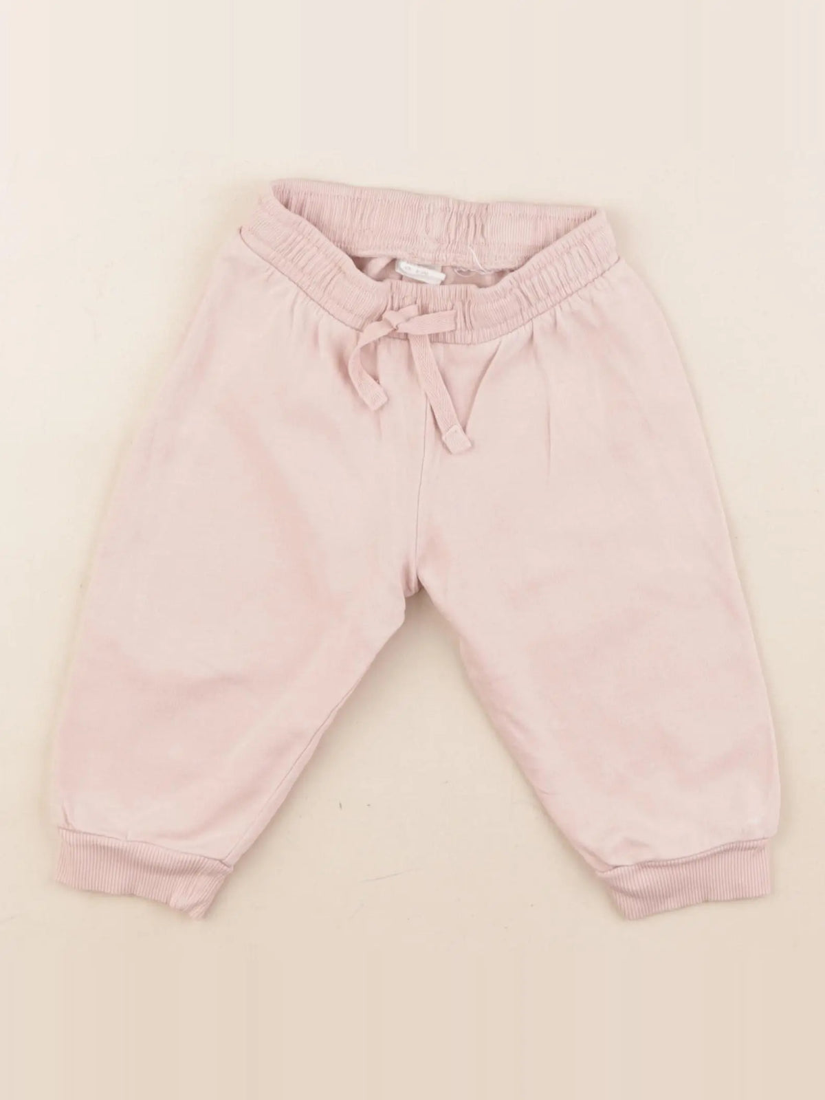 H&M - jogging rose - 6/9 mois