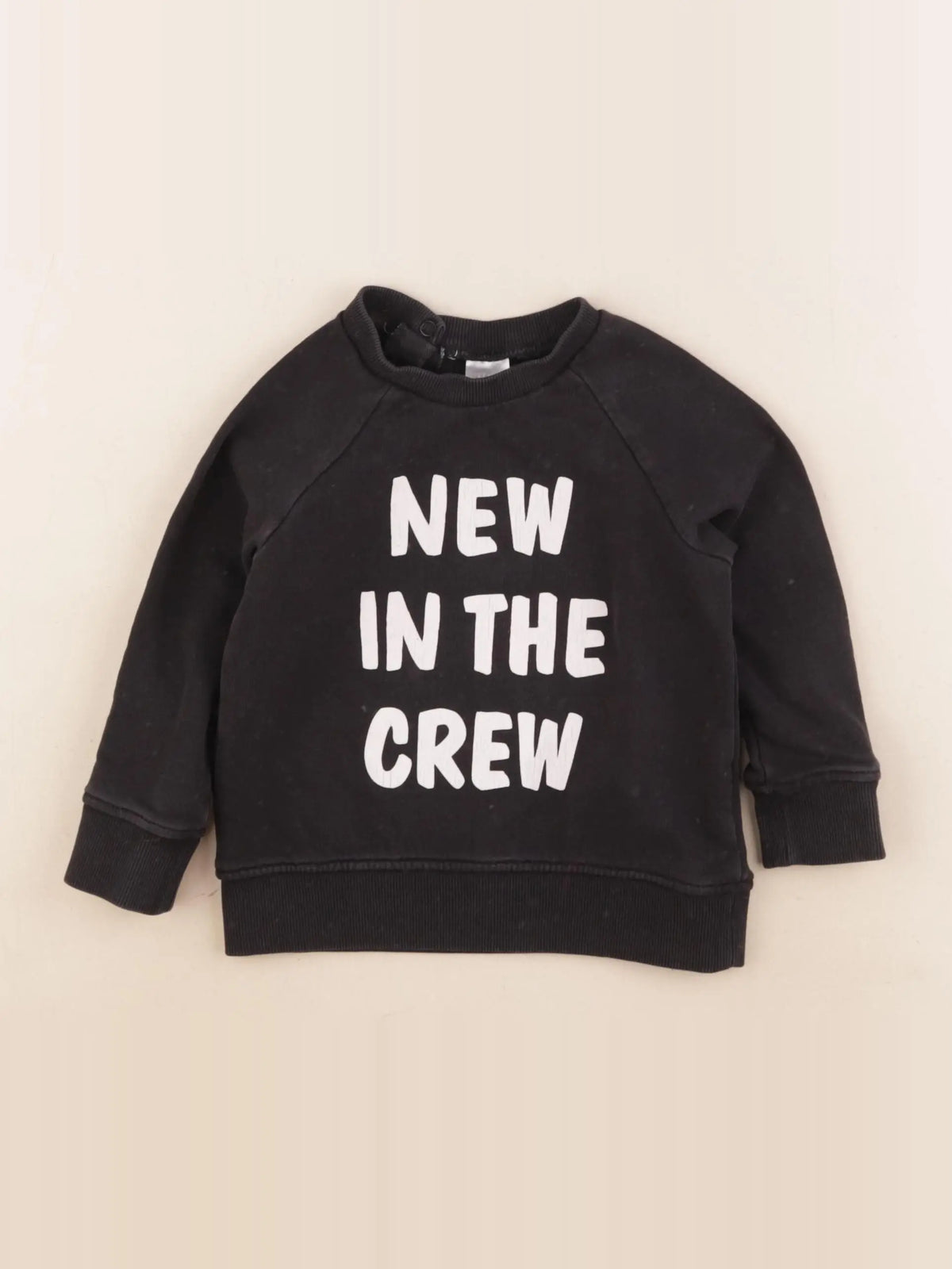 H&M - sweat noir - 12/18 mois