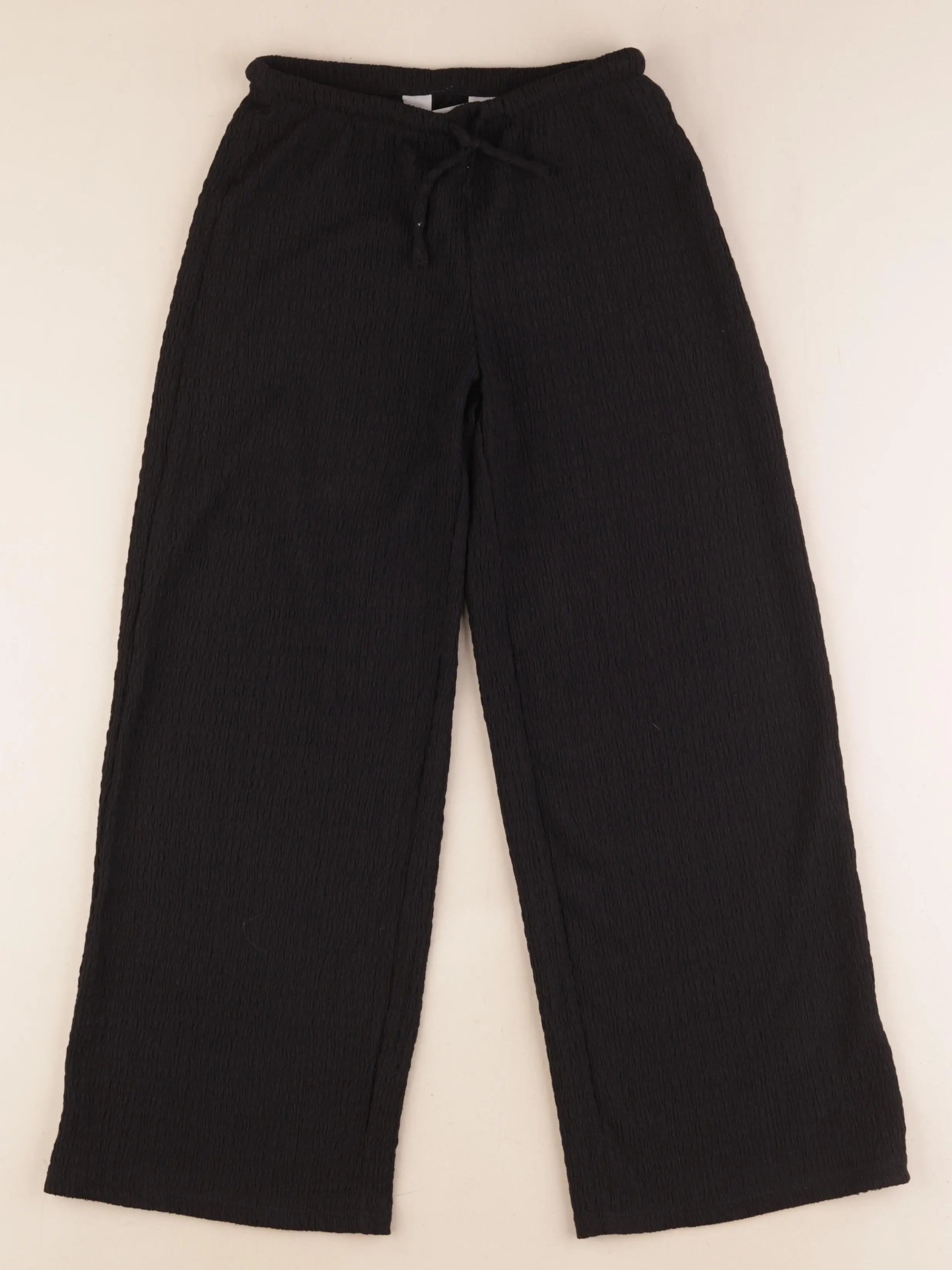H&M - pantalon noir - 8/9 ans