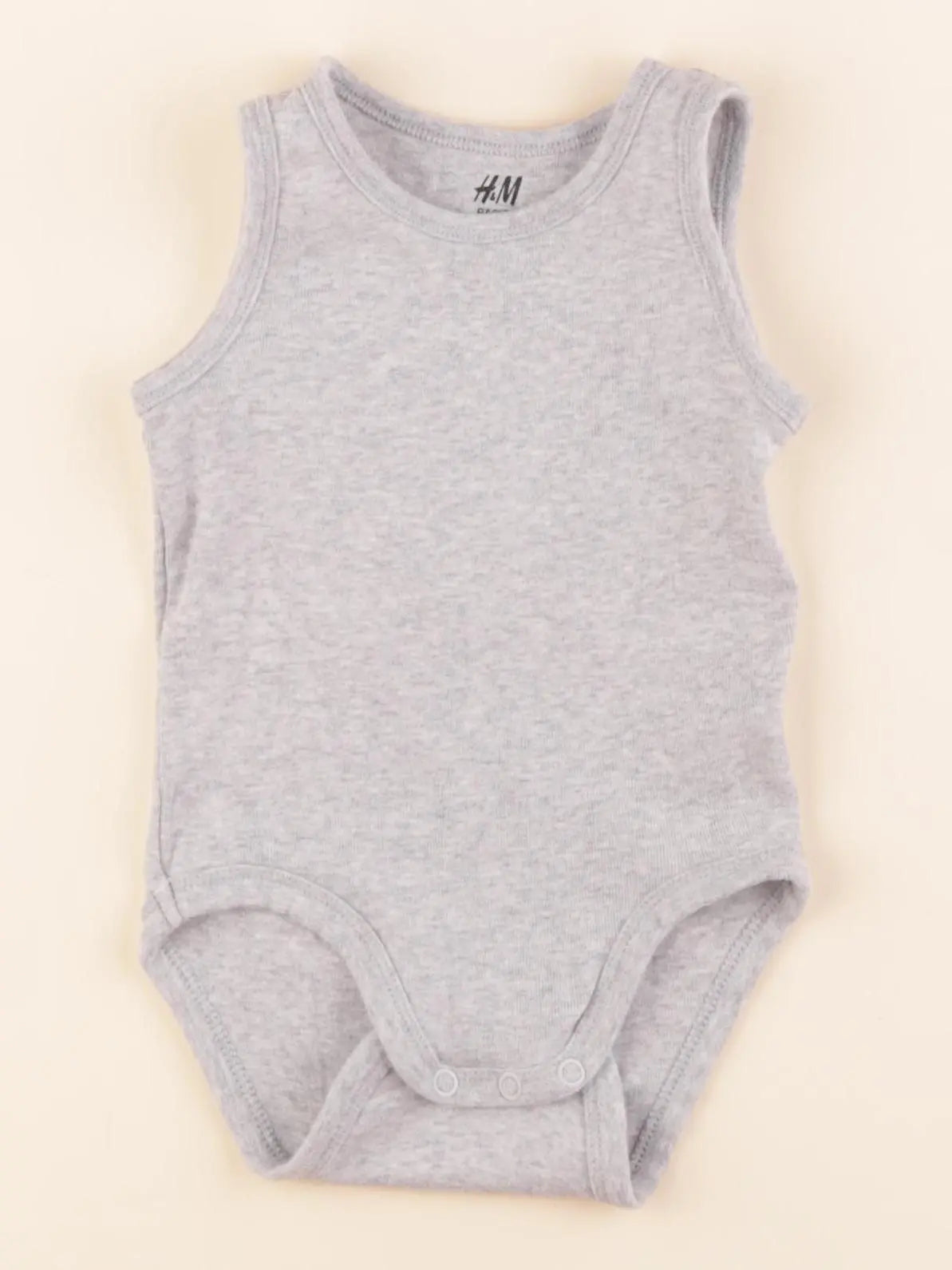 H&M - body gris - 4/6 mois