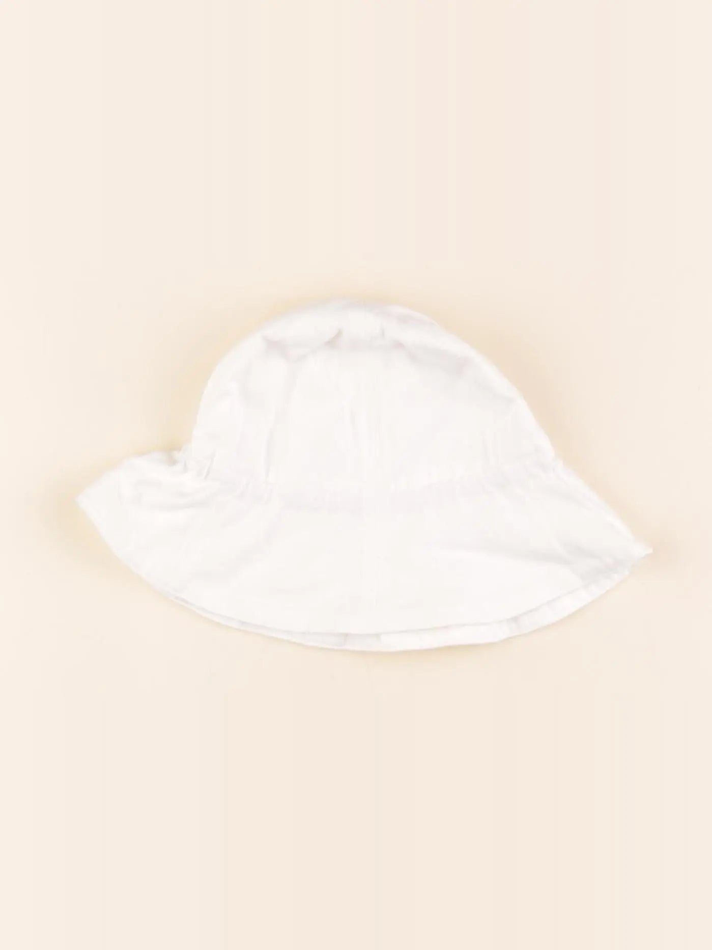 Uniqlo - chapeau blanc - 6/18 mois