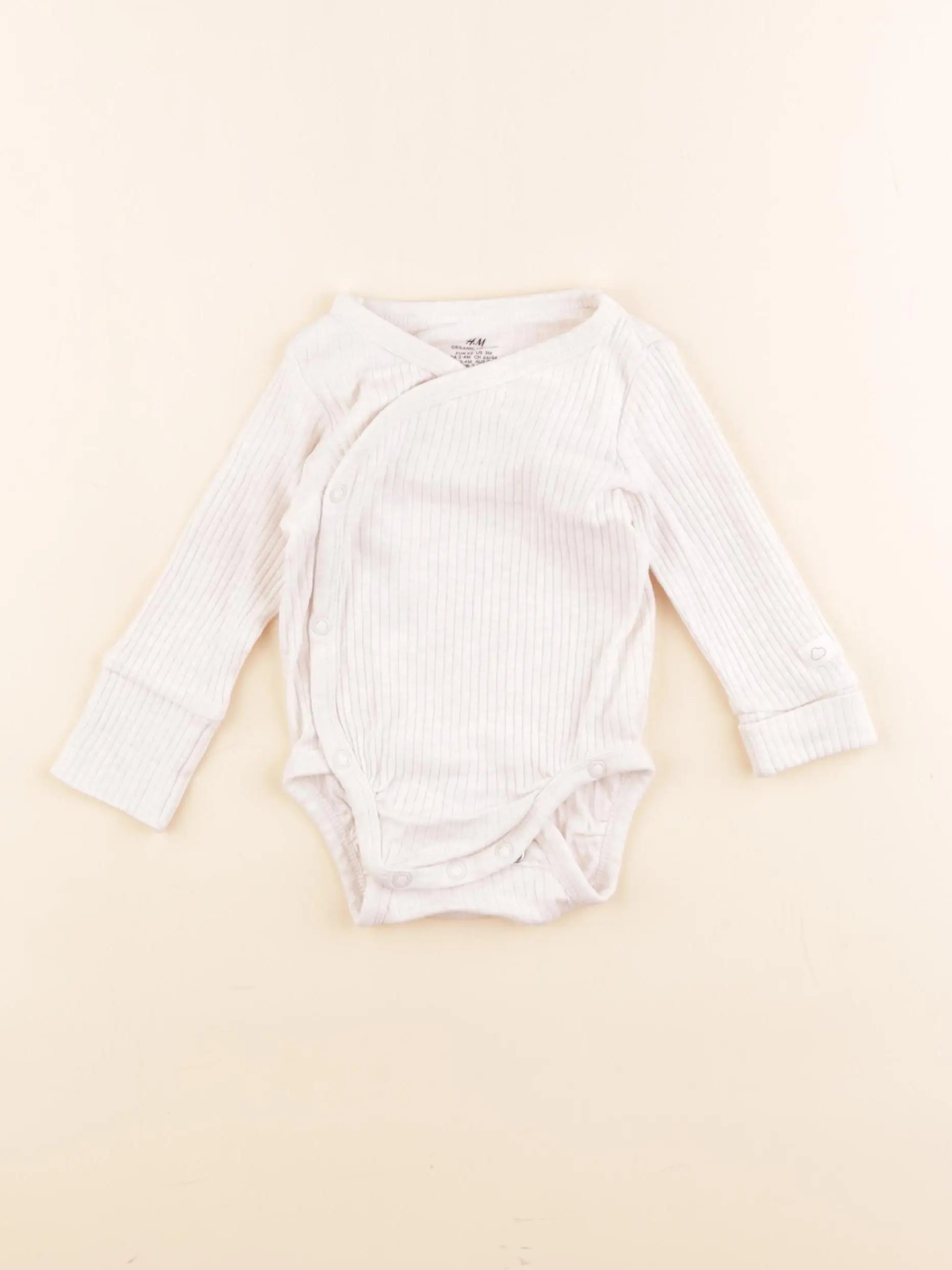 H&M - body beige - 2/4 mois