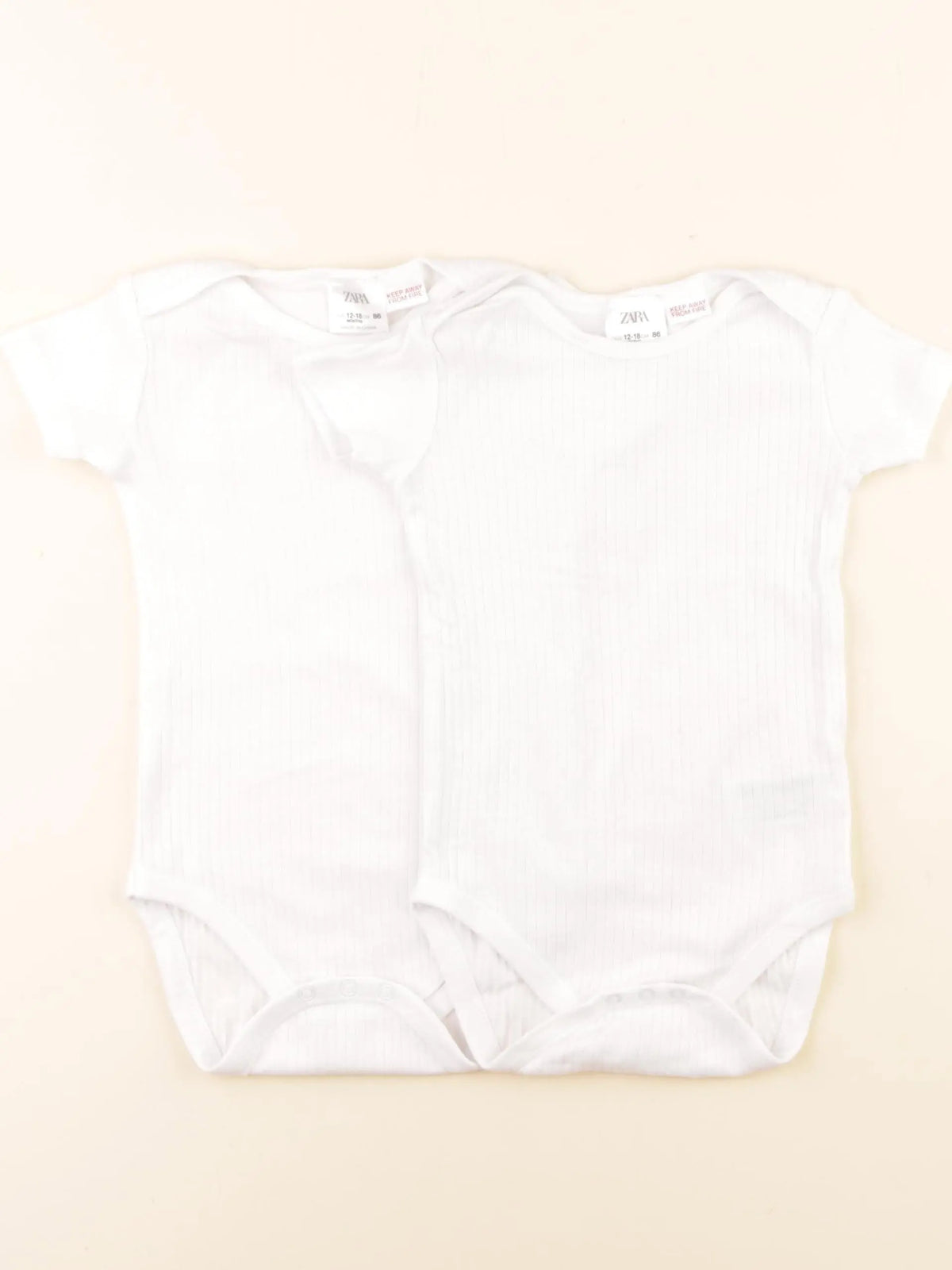 Zara - lot de 2 bodies en coton blanc - 12/18 mois