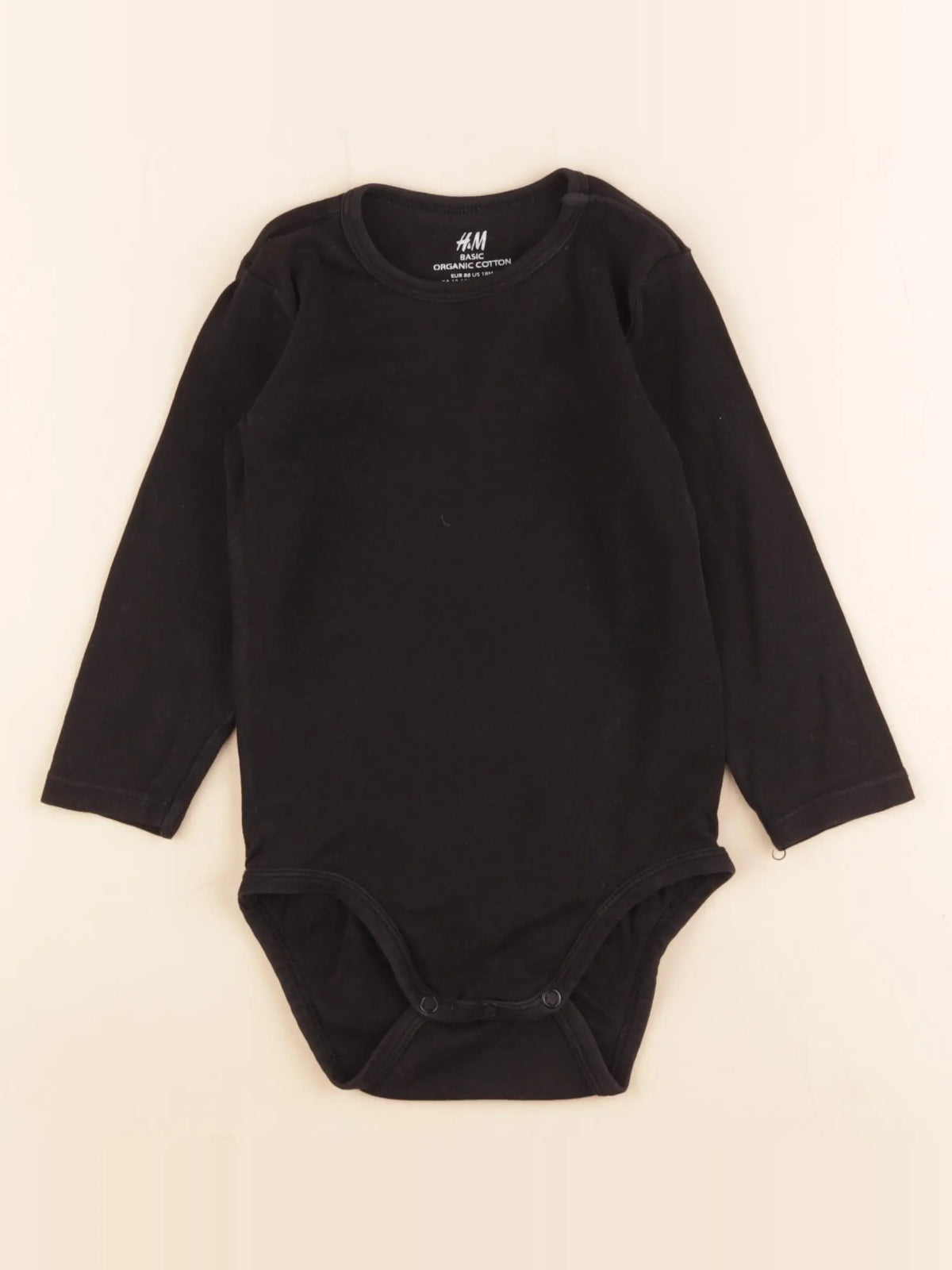 H&M - body noir - 12/18 mois