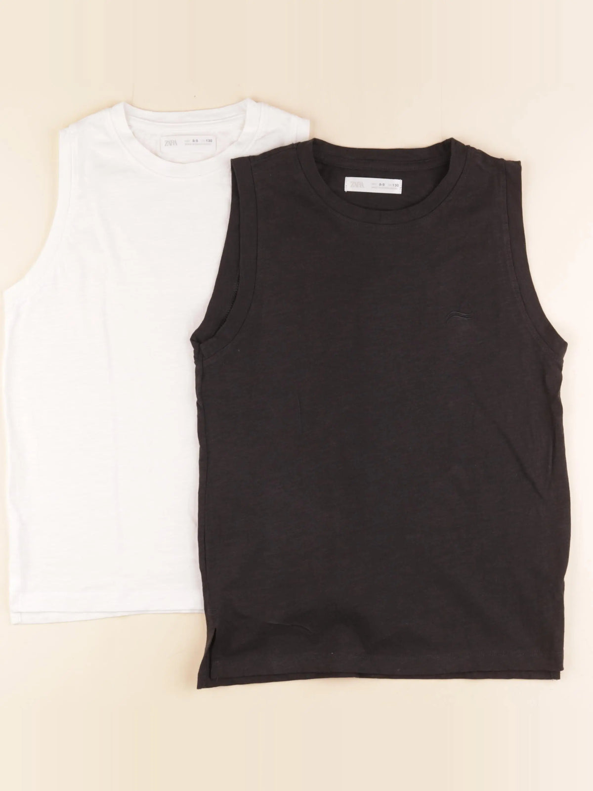Zara - lot de 2 débardeurs noir, blanc - 8/9 ans