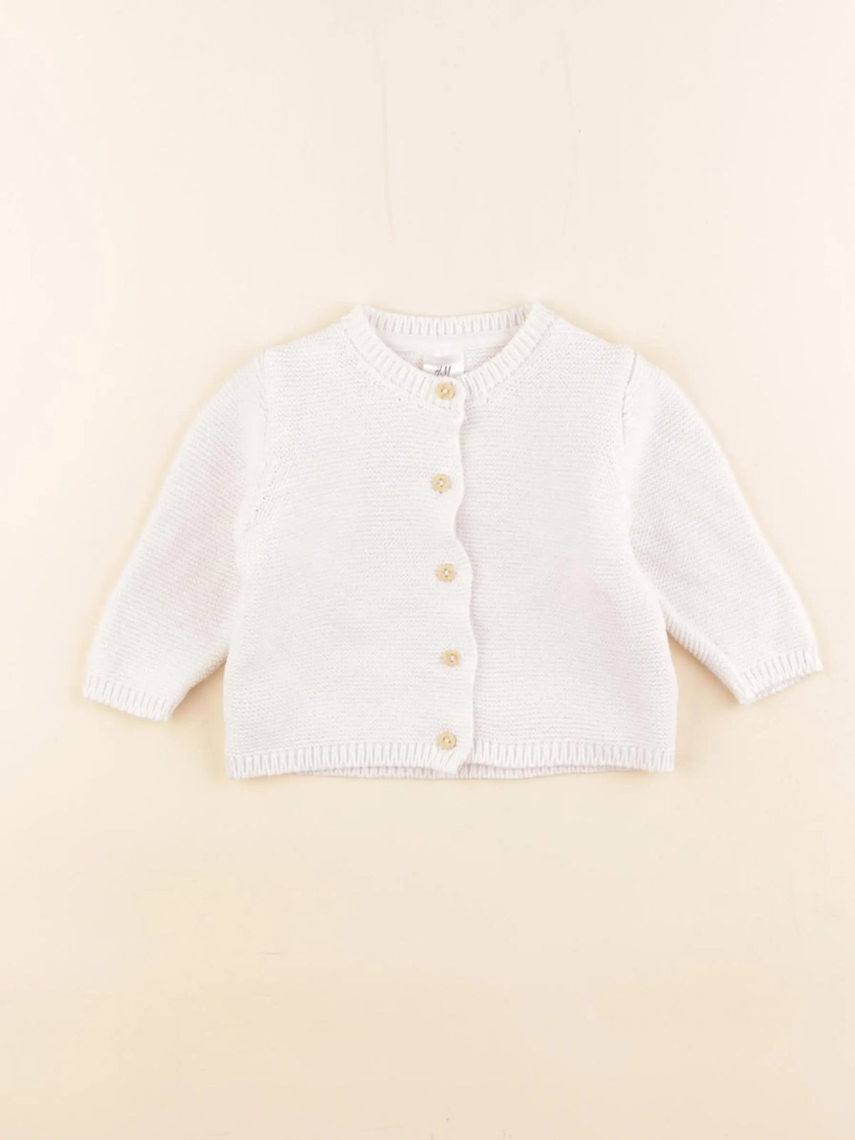 H&M - gilet blanc - 1/2 mois