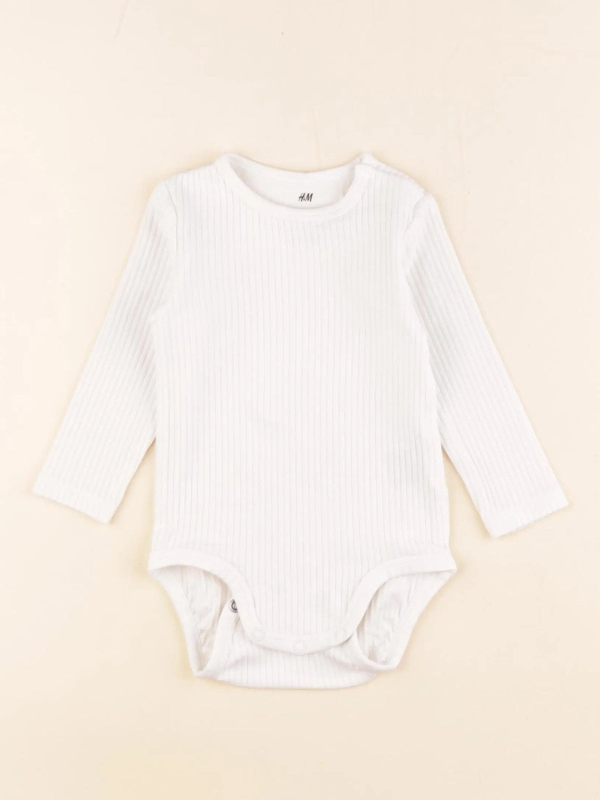 H&M - body beige - 4/6 mois