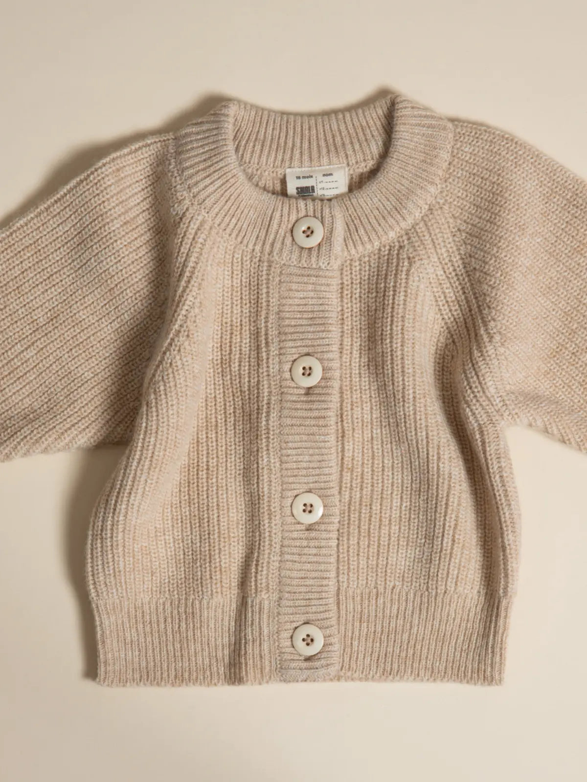 Le gilet bébé 100% laine Beige nougat