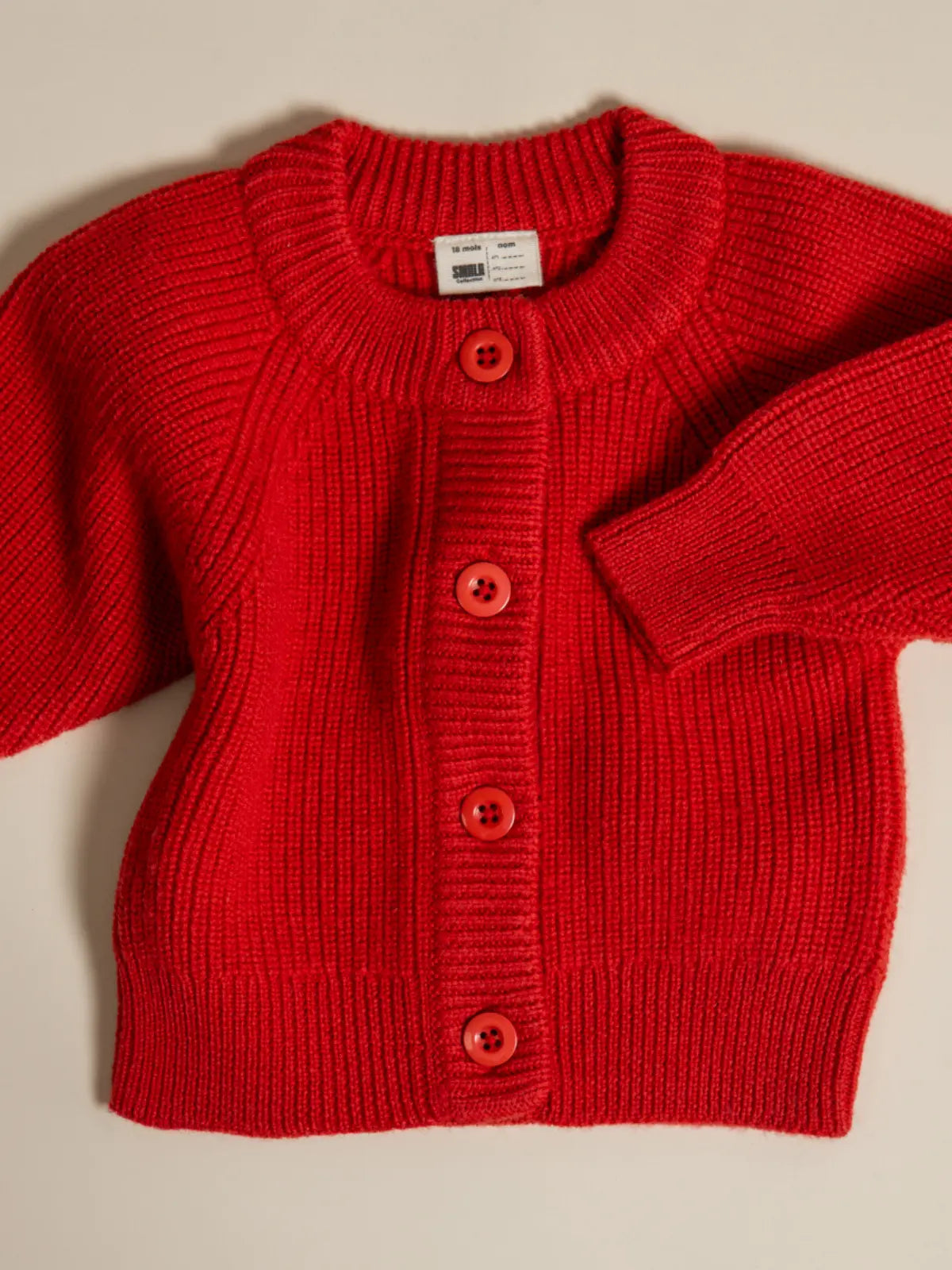 Le gilet bébé 100% laine Rouge coquelicot
