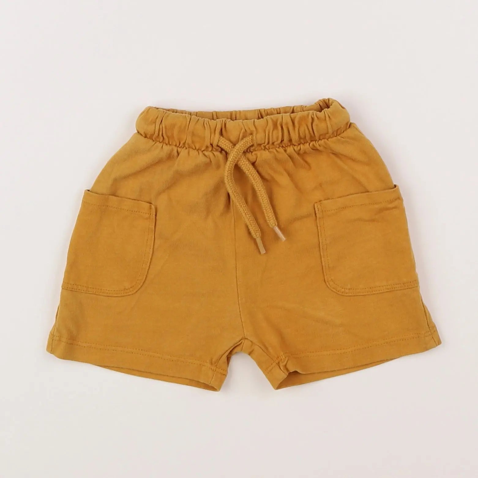 Vertbaudet - short jaune - 9 mois