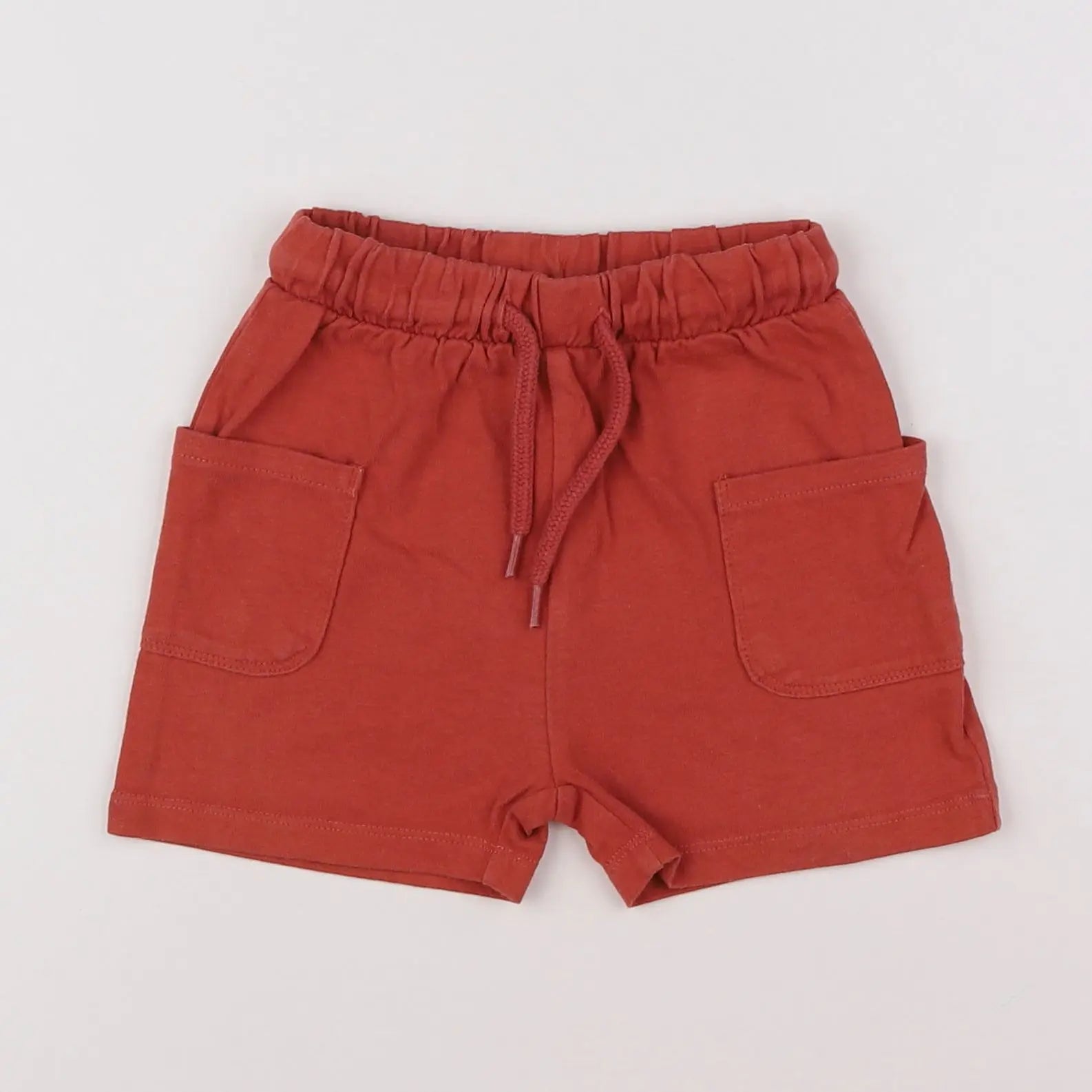 Vertbaudet - short rouge - 12 mois