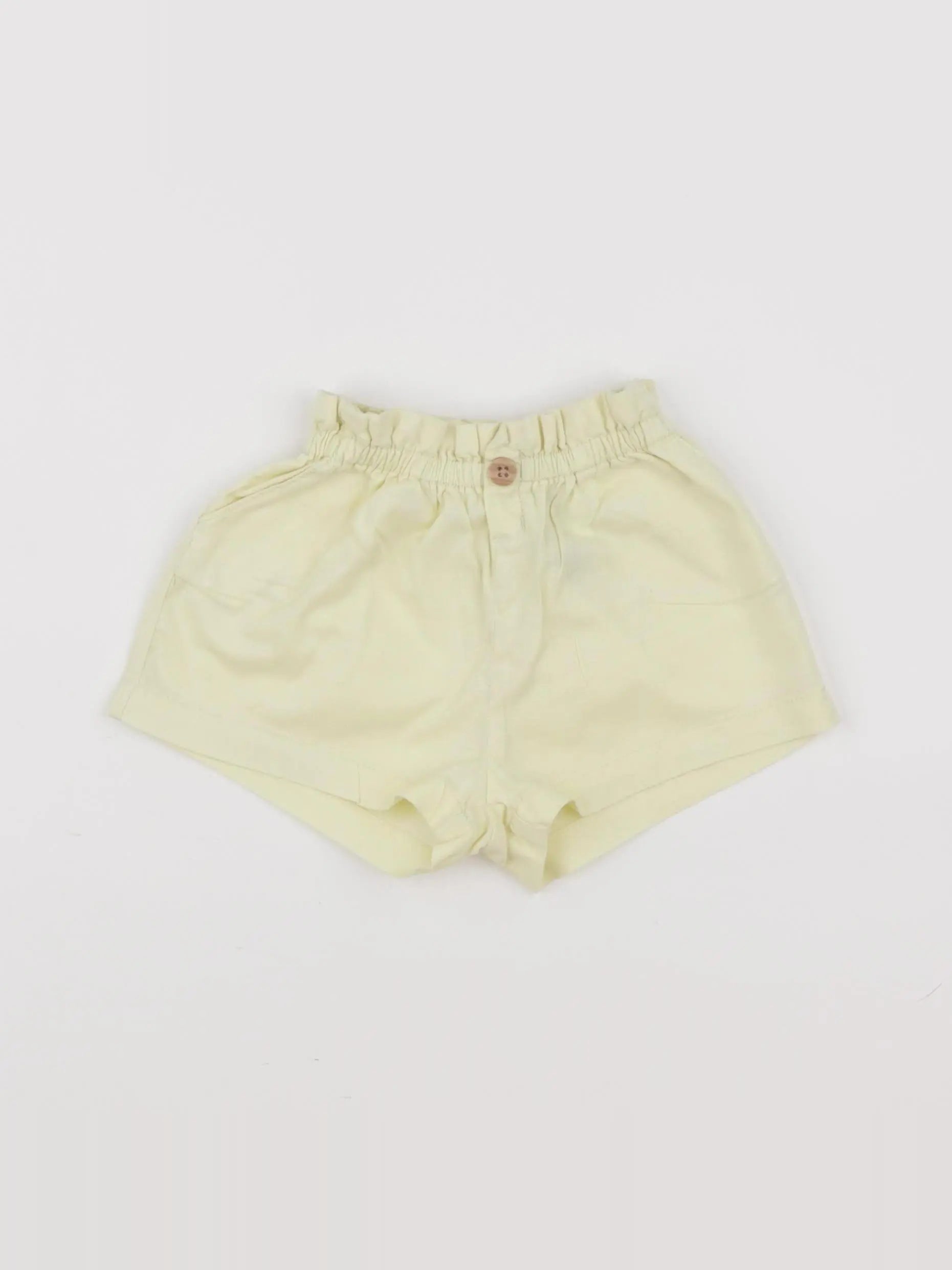 H&M - short jaune - 6/9 mois