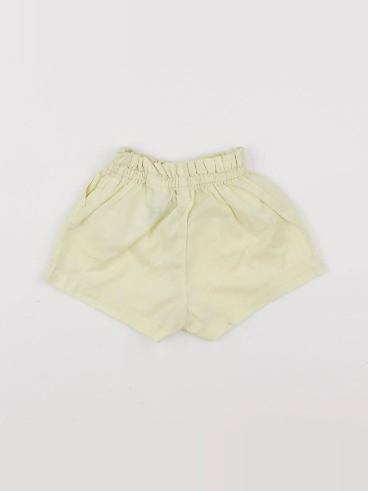 H&M - short jaune - 6/9 mois