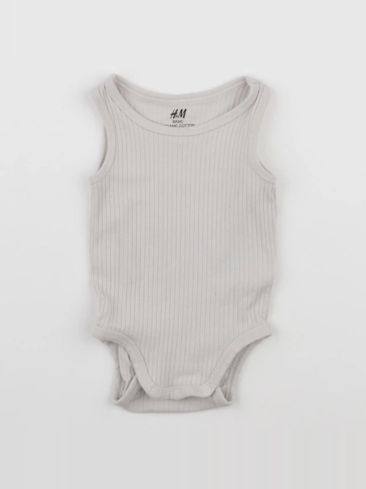 H&M - body beige - 3 mois