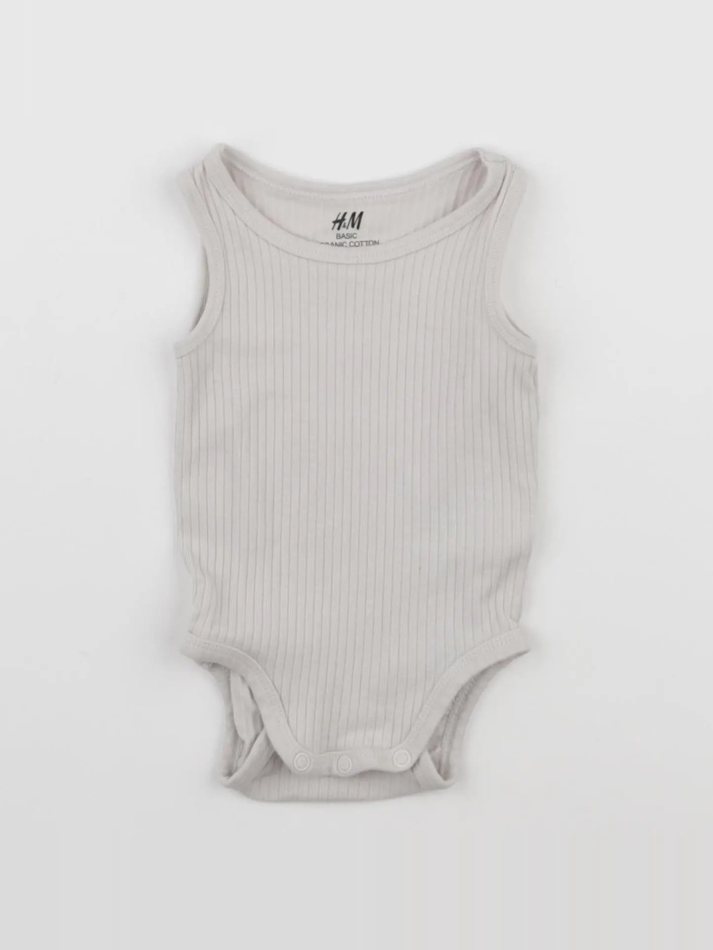 H&M - body beige - 3 mois