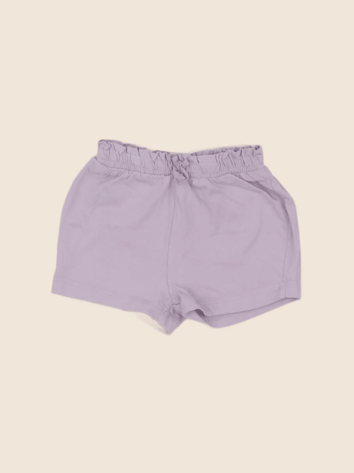 H&M - short violet - 3/6 mois