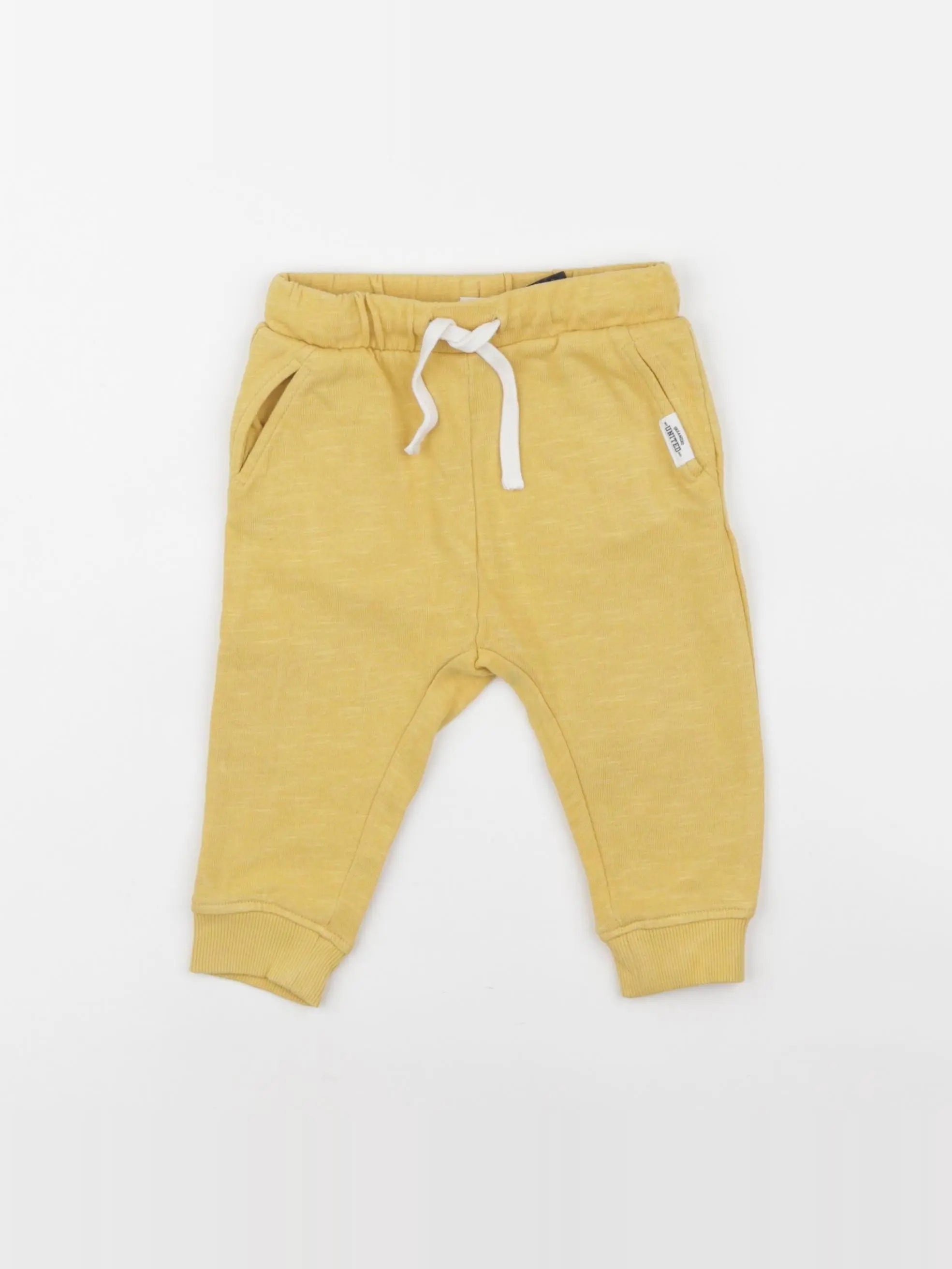 H&M - jogging jaune - 6/9 mois