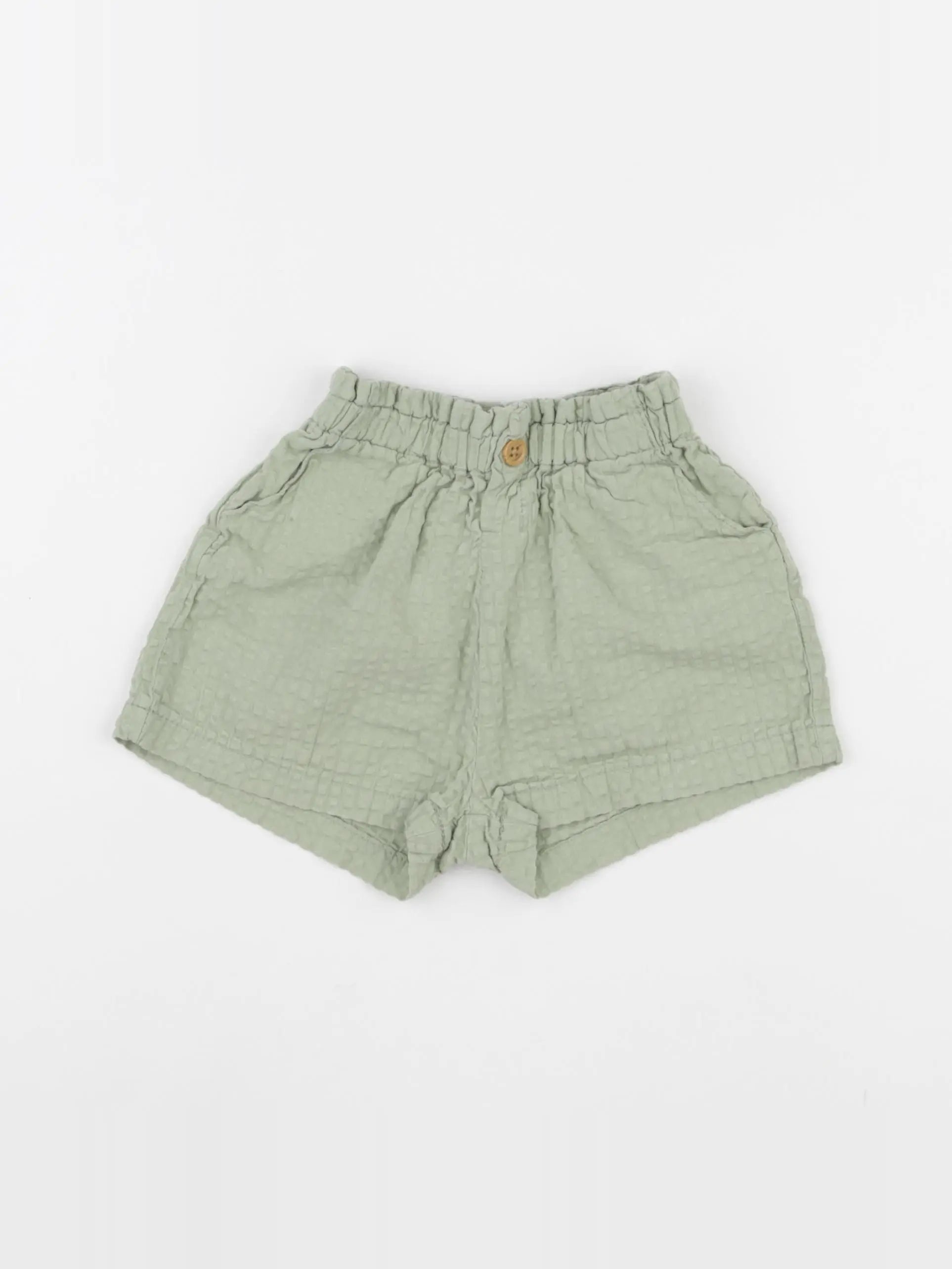 H&M - short vert - 9/12 mois