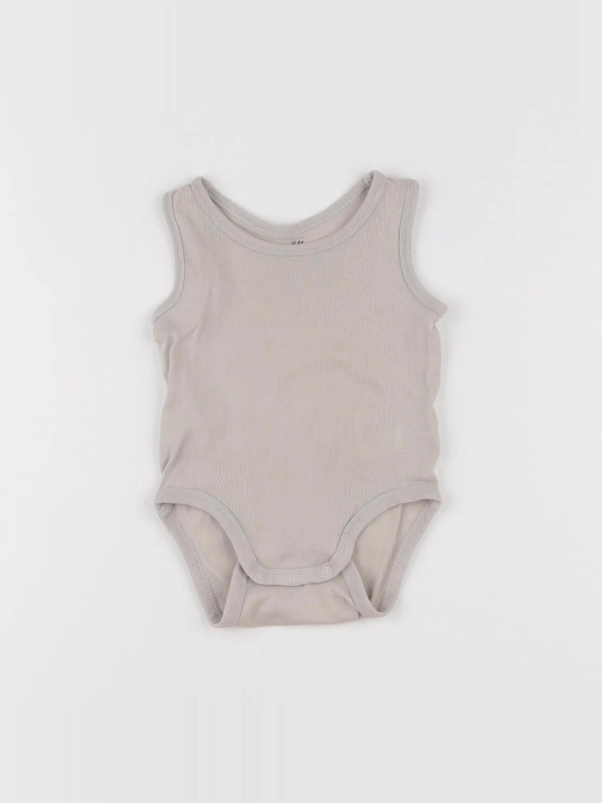 H&M - body beige - 3/6 mois