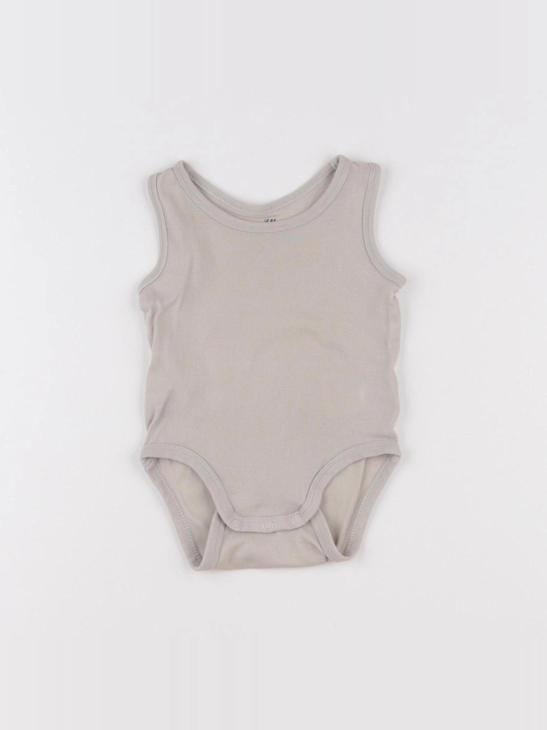 H&M - body beige - 3/6 mois