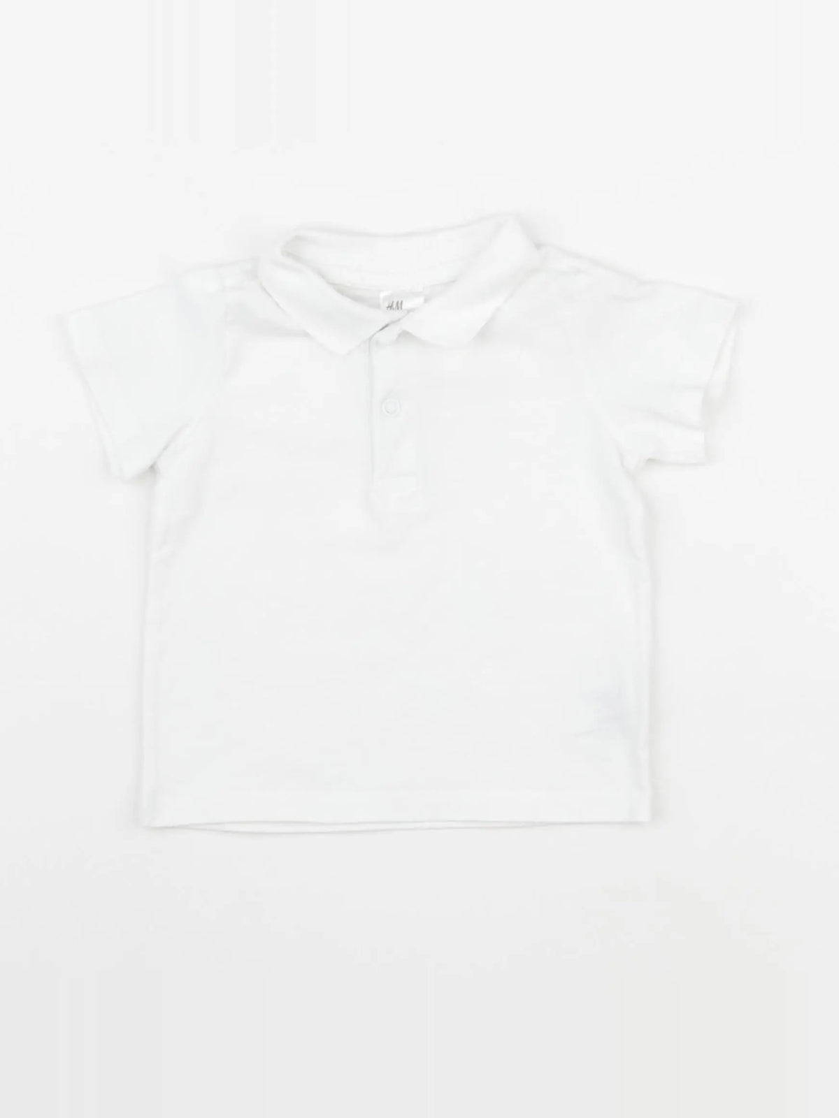 H&M - polo blanc - 6 mois