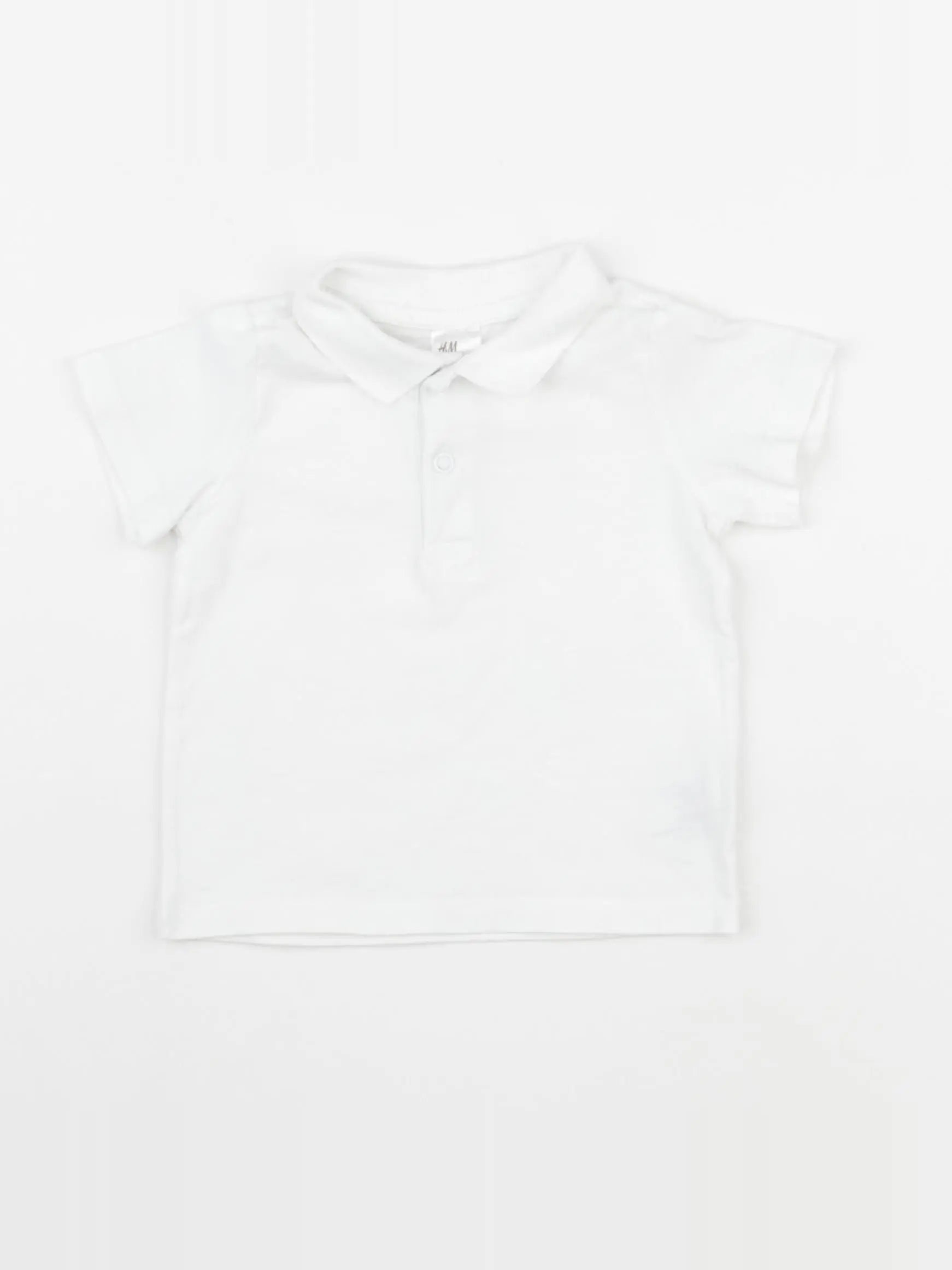 H&M - polo blanc - 6 mois