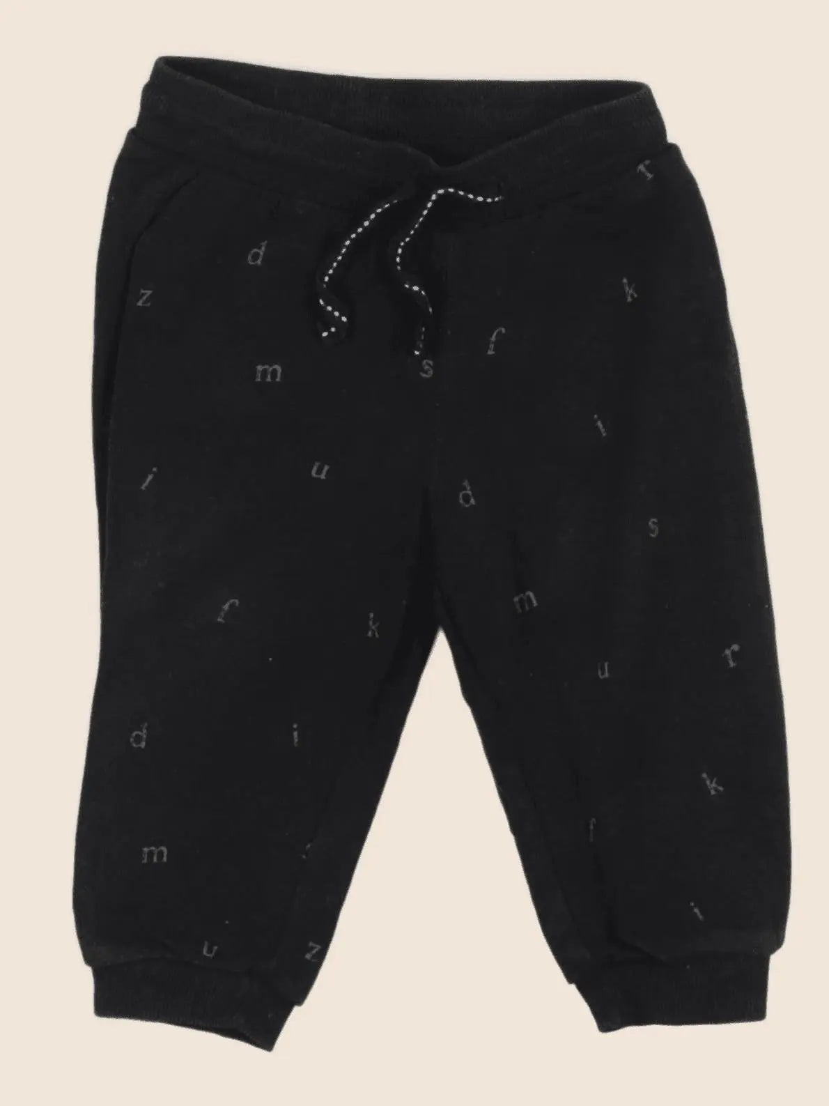 H&M - jogging noir - 6/9 mois