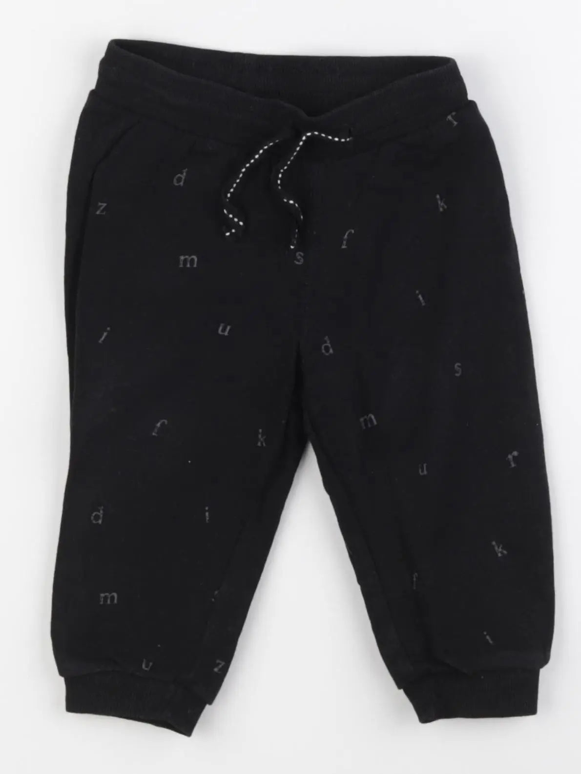 H&M - jogging noir - 6/9 mois