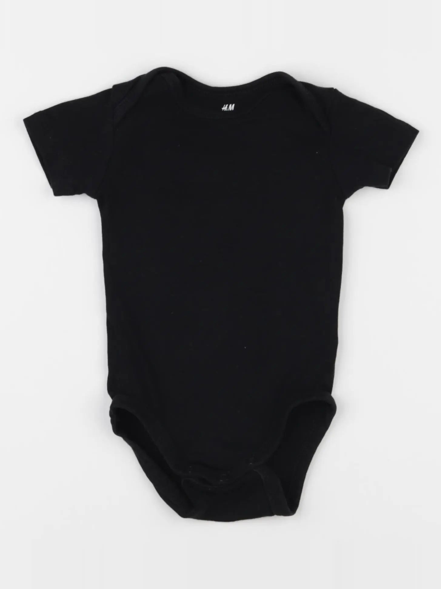 H&M - body noir - 3 mois