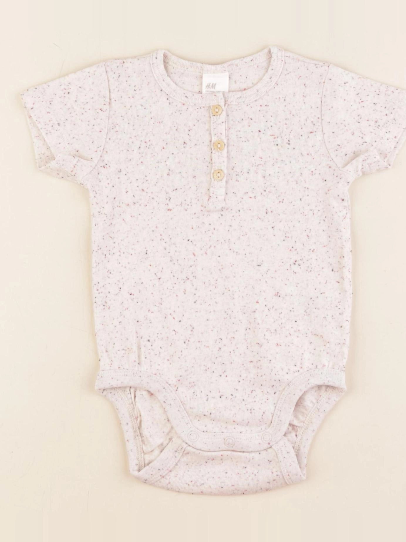 H&M - body beige - 4/6 mois