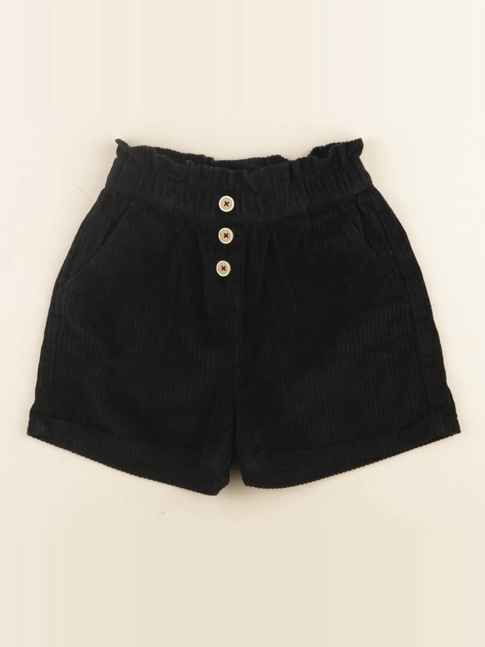 Tape à l'oeil - short noir - 7 ans