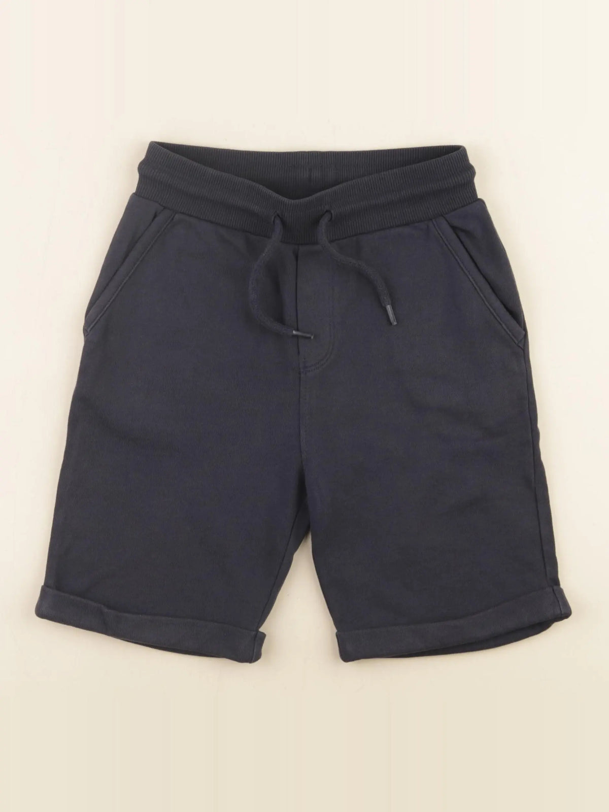 Tape à l'oeil - short bleu - 7 ans