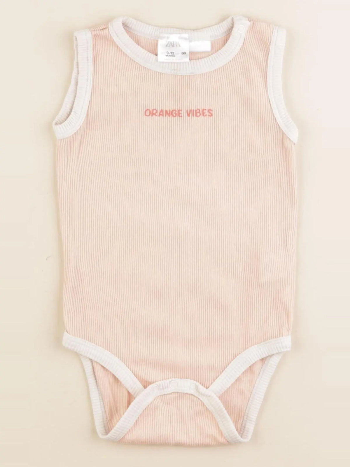 Zara - body orange - 12/9 mois