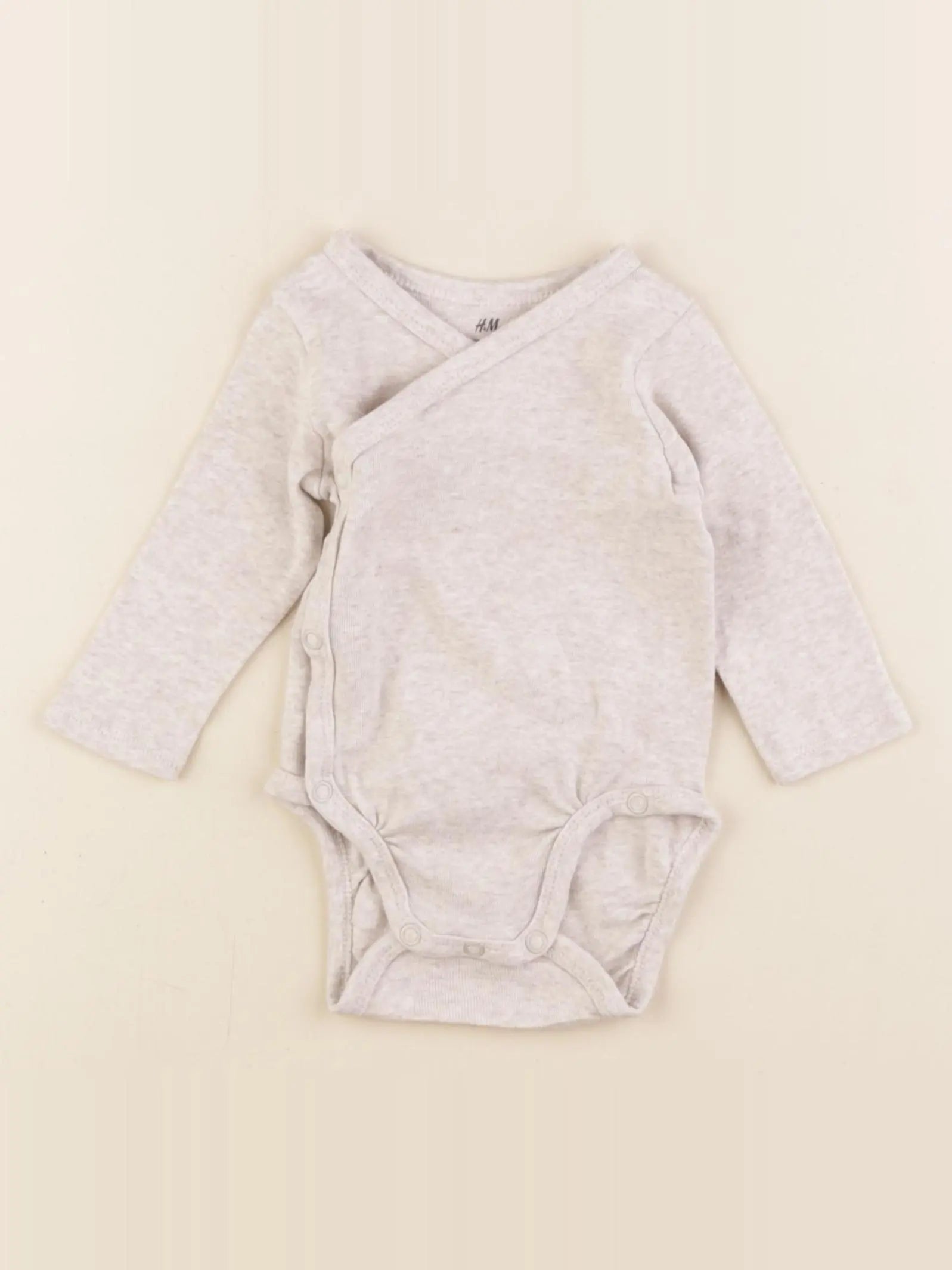 H&M - body beige - 3/4 mois