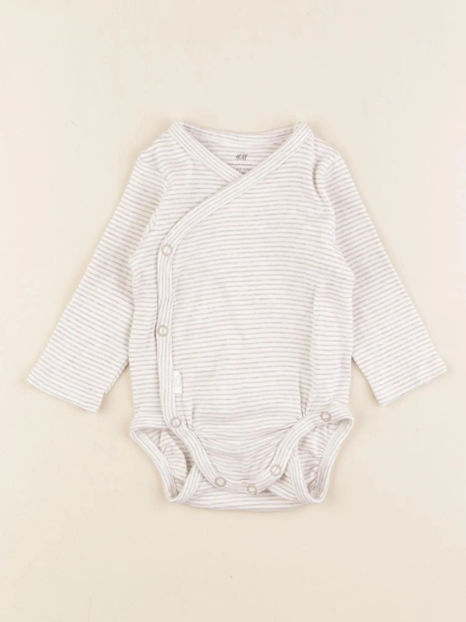 H&M - body beige - 2/4 mois