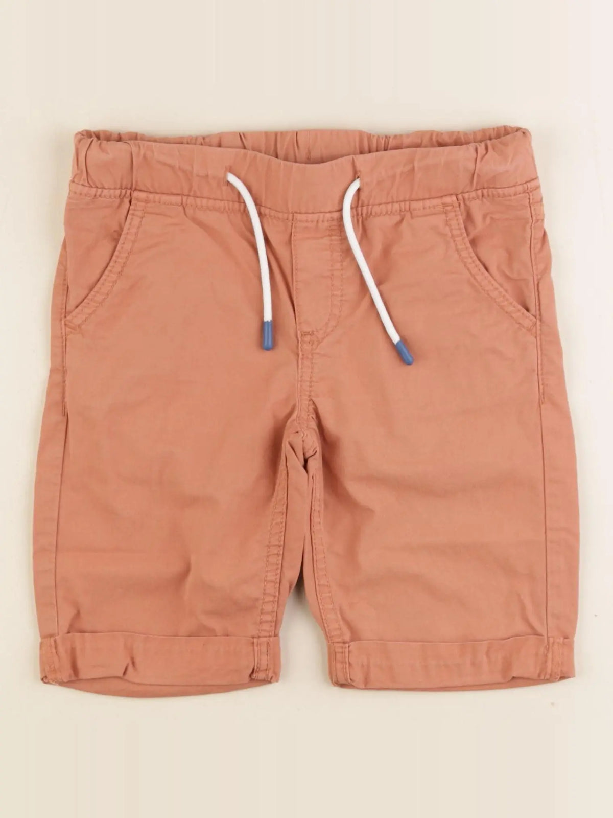 Vertbaudet - short orange - 7 ans