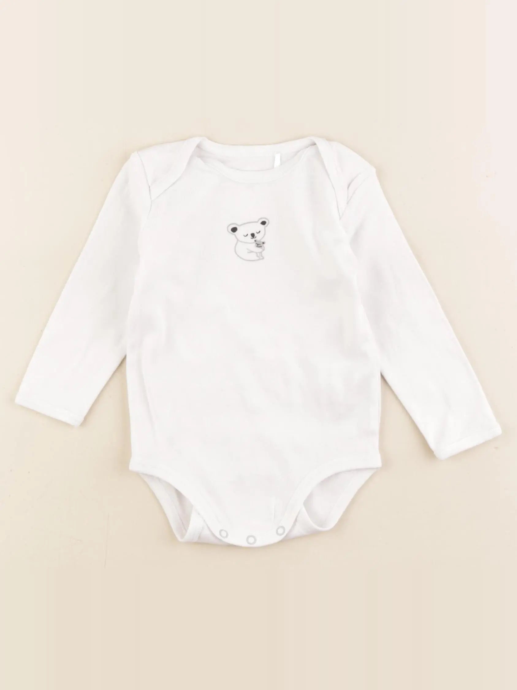Boutchou - body blanc - 9 mois
