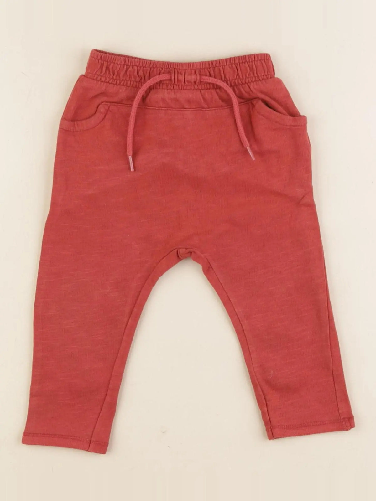 Vertbaudet - sarouel rouge - 3/6 mois