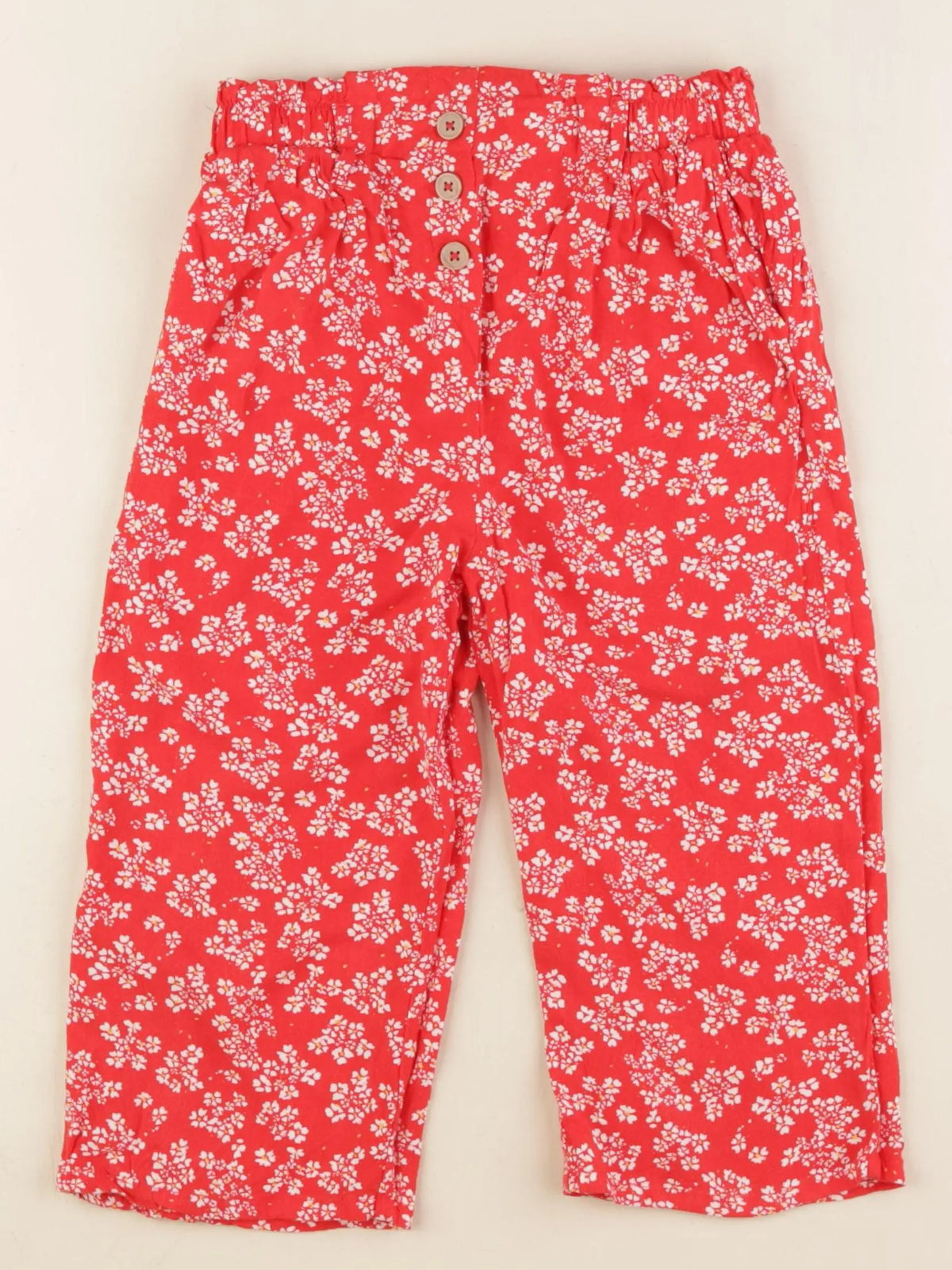 Vertbaudet - pantacourt rouge - 7 ans