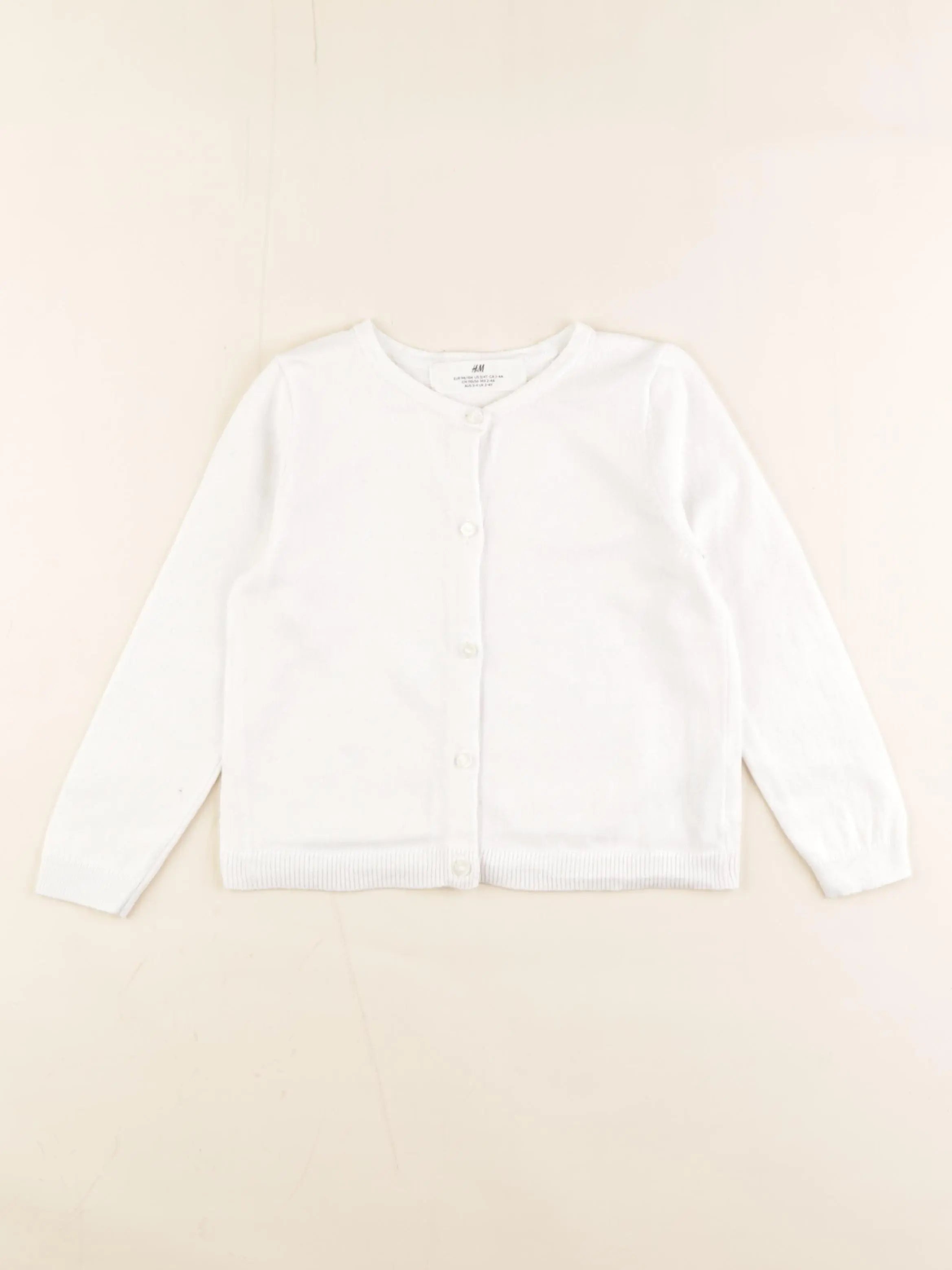 H&M - gilet blanc - 2/4 ans