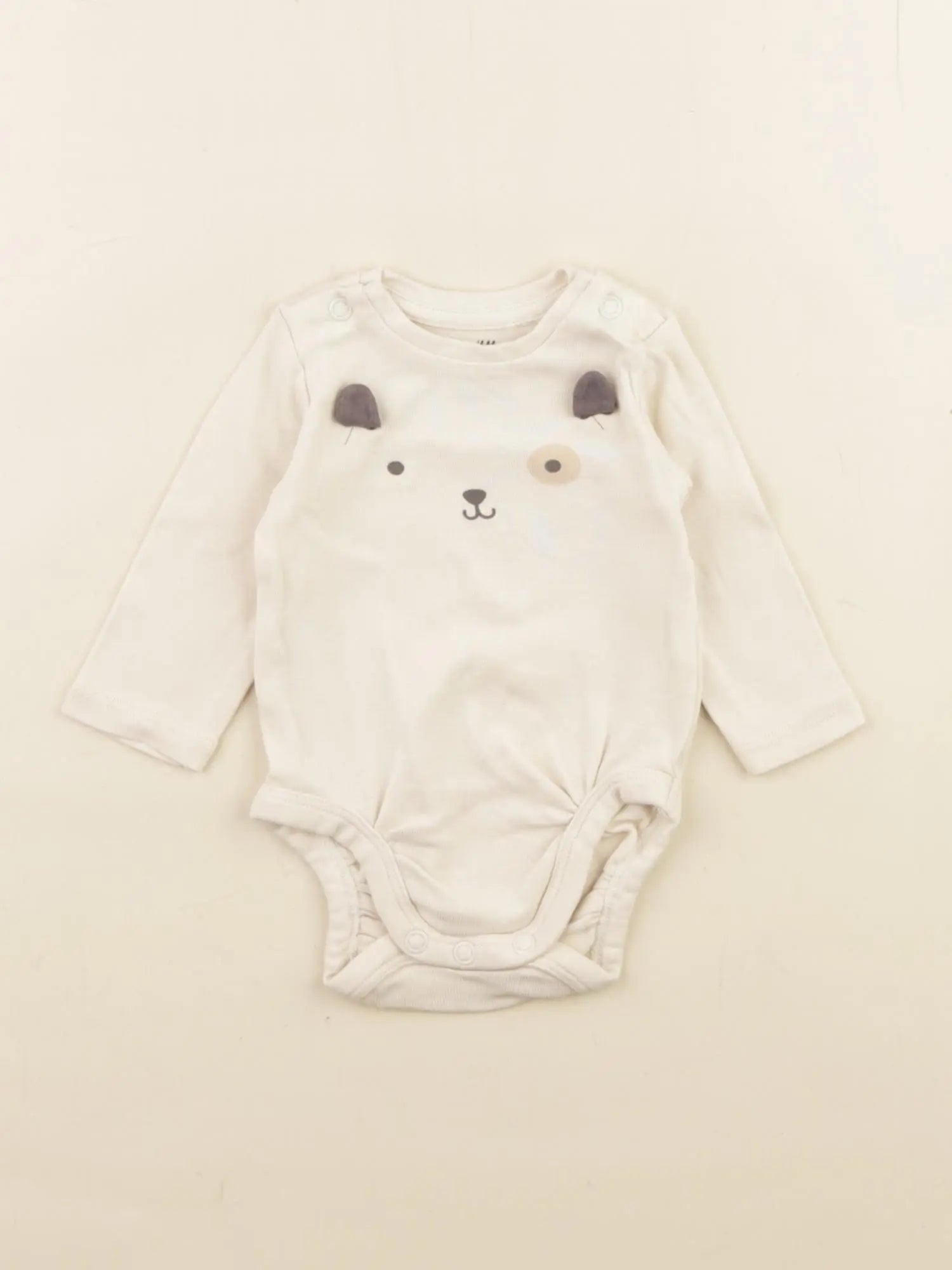 H&M - body beige - 0/1 mois