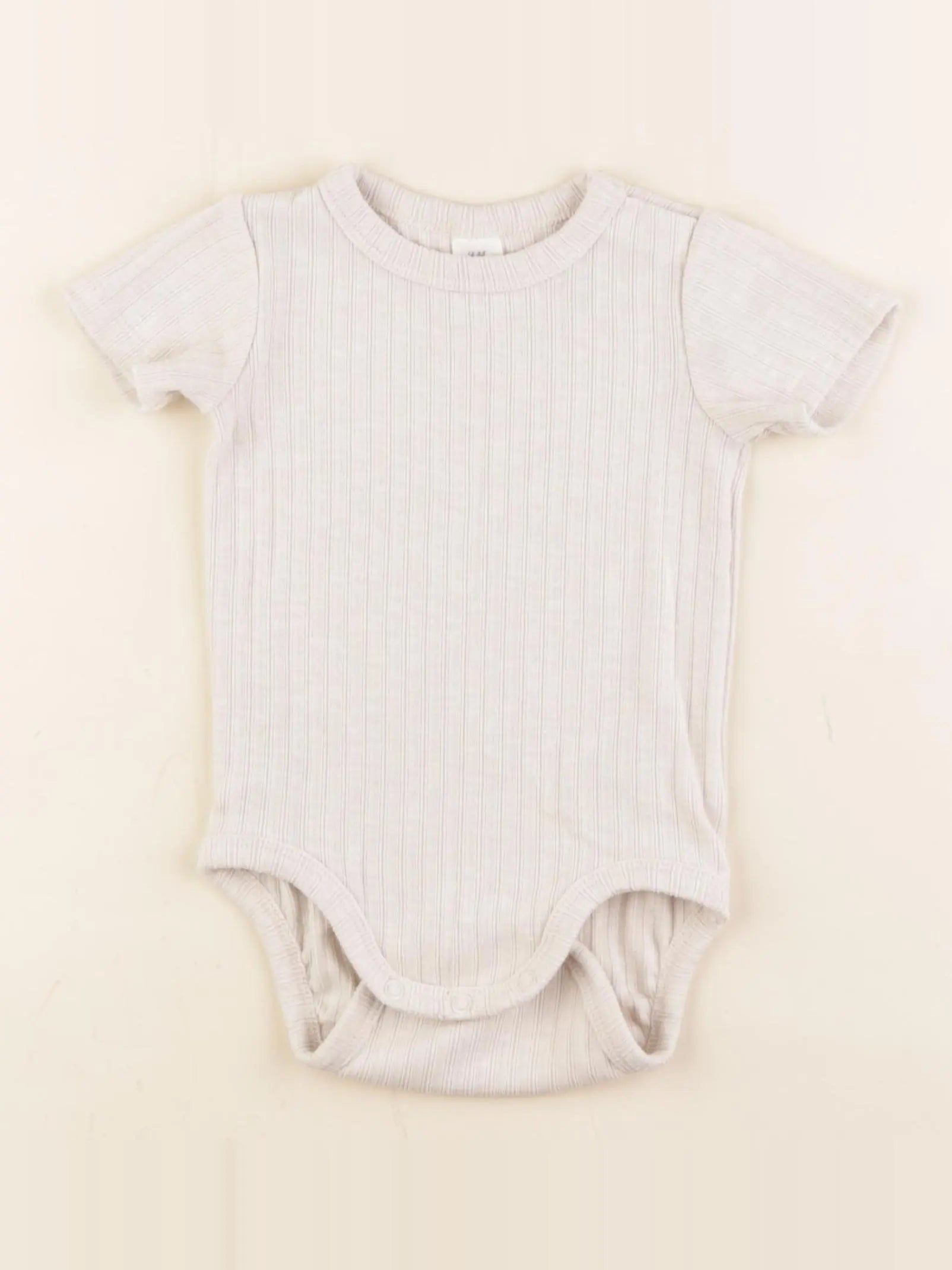 H&M - body beige - 9 mois