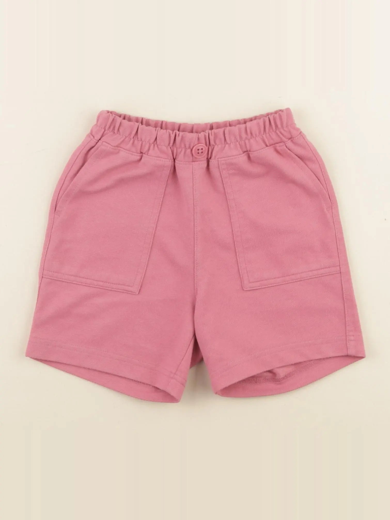 Uniqlo - short rose - 12/18 mois