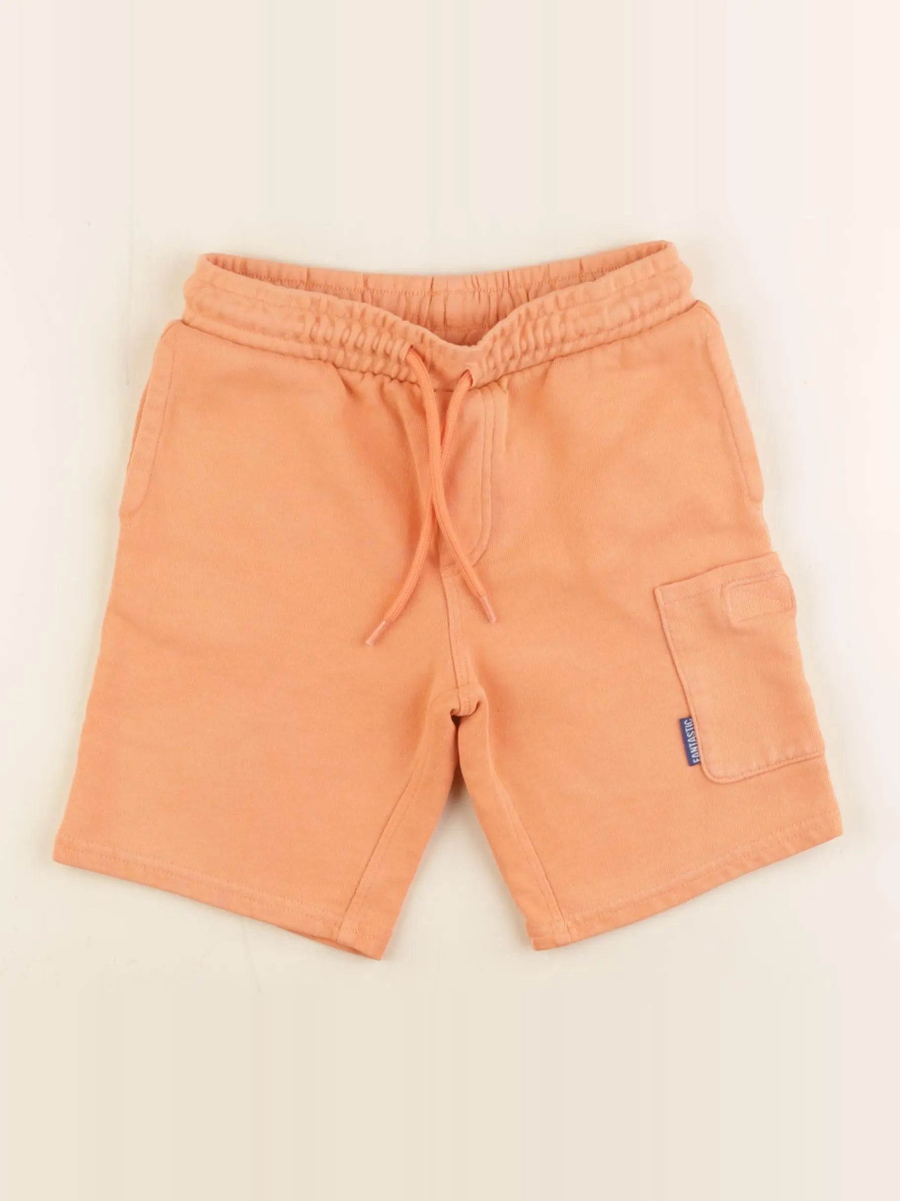 Tape à l'oeil - short orange - 7 ans
