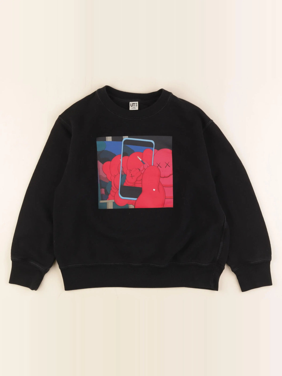 Uniqlo - sweat noir - 7/8 ans