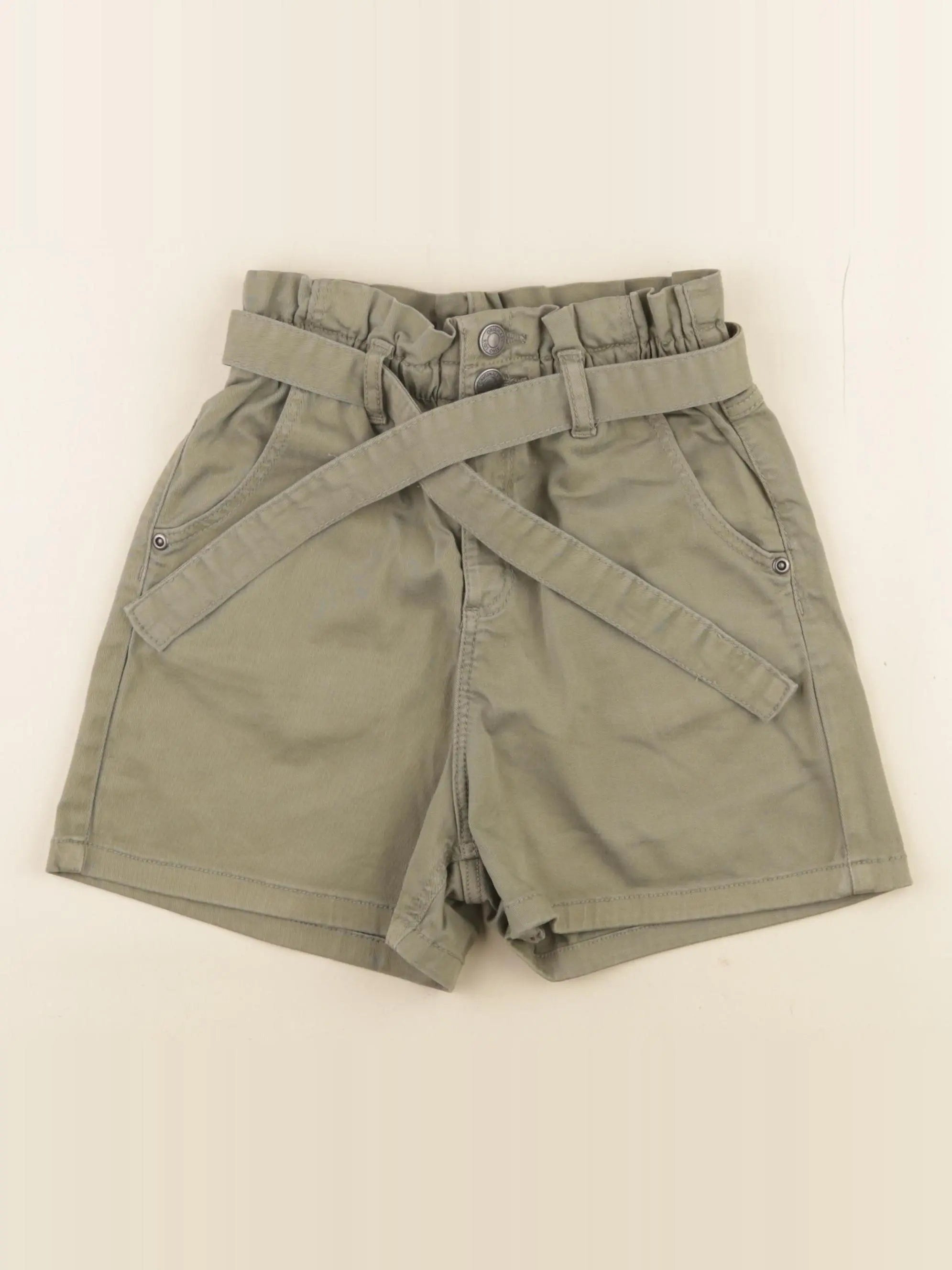 Little Cigogne - short vert - 10 ans